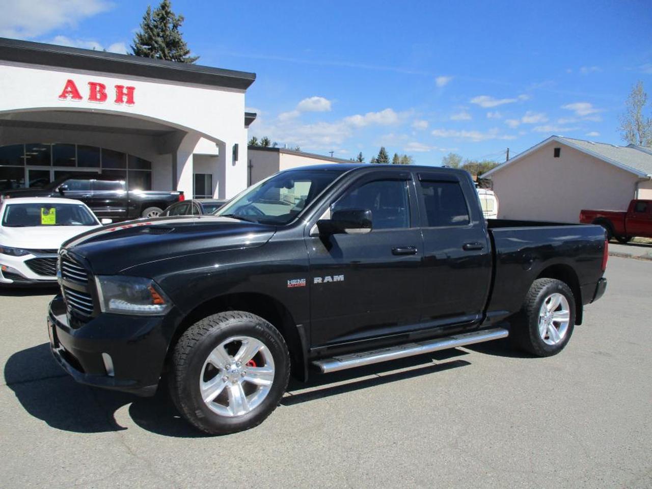 2015 RAM 1500 SPORT QUAD CAB 4WD - Photo #1