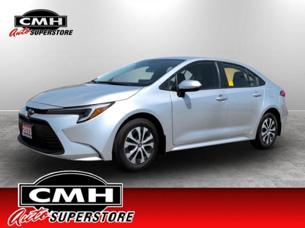<b>HYBRID !! REAR CAMERA, BLIND SPOT DETECTION, ADAPTIVE  CRUISE CONTROL, LANE DEPARTURE, COLLISION SENSORS, CROSS TRAFFIC ALERT, AUTO HIGH BEAM, PHONE PROJECTION, HEATED FRONT SEATS, CLIMATE CONTROL, EV MODE **PREV. RENTAL - $3,674 DAM. REP**<br> <br></b><br>  <br>CMH certifies that all vehicles meet DOUBLE the Ministry standards for Brakes and Tires. The advertised price is the promotional financing price. For all other methods of payment, the selling price is $500 higher.<br><br> <br>This 2023 Toyota Corolla is for sale today. <br> <br>With a distinctive design, robust engineering and all-round practicality, this 2023 Corolla is a popular choice for shoppers who prioritize safety and style. A well-built interior with amazing standard technology ensures that this sedan withstands the day-to-day activities of an urban commute. A roomy cabin with comfortable ride quality ensures that occupants enjoy a smooth journey, both in the city and the highway. This sedan has 93,108 km. Its Classic Silver Metallic in colour. It has an Automatic transmission and is powered by a 138HP 1.8L 4 Cylinder Engine. <br> <br> Our Corollas trim level is Hybrid LE. This Corolla Hybrid LE is amazing on efficiency and boasts several features like heated front seats, automatic climate control, sleek Bi-LED headlights, a larger 8 inch touchscreen display featuring Apple CarPlay, Android Auto, advanced voice recognition, 6 speakers, next gen USB 2.0 audio ports, wireless streaming audio, SIRI Eyes Free and a handy rear view camera. Additional features include blind spot detection, remote keyless entry, Toyota Safety Sense, dynamic radar cruise control, lane departure warning with lane steering assist, power adjustable heated mirrors and so much more.<br> <br>To apply right now for financing use this link: <a href=https://www.cmhniagara.com/financing/ target=_blank>https://www.cmhniagara.com/financing/</a><br><br> <br/><br>**PLEASE NOTE:** The functionality and condition of any accessories and aftermarket parts are not guaranteed by CMH Auto Superstore. Examples of such items include, but are not limited to: tonneau covers, radios, cameras, remote starts, vent visors, roof racks, winches, light bars, headlights/tail lights, center caps, running boards, etc. If an aftermarket part is safety-related and found to be defective, it will be replaced by a factory option.<br><b>**CMH Auto Superstore reserves the right to choose to repair, modify, or replace all aftermarket parts (example  headlights) or accessories at its sole discretion.**</b><br><br>Trade-ins are welcome! Financing available OAC ! Price INCLUDES a valid safety certificate! Price INCLUDES a 60-day limited warranty on all vehicles except classic or vintage cars. CMH is a Full Disclosure dealer with no hidden fees. We are a family-owned and operated business for over 30 years! o~o