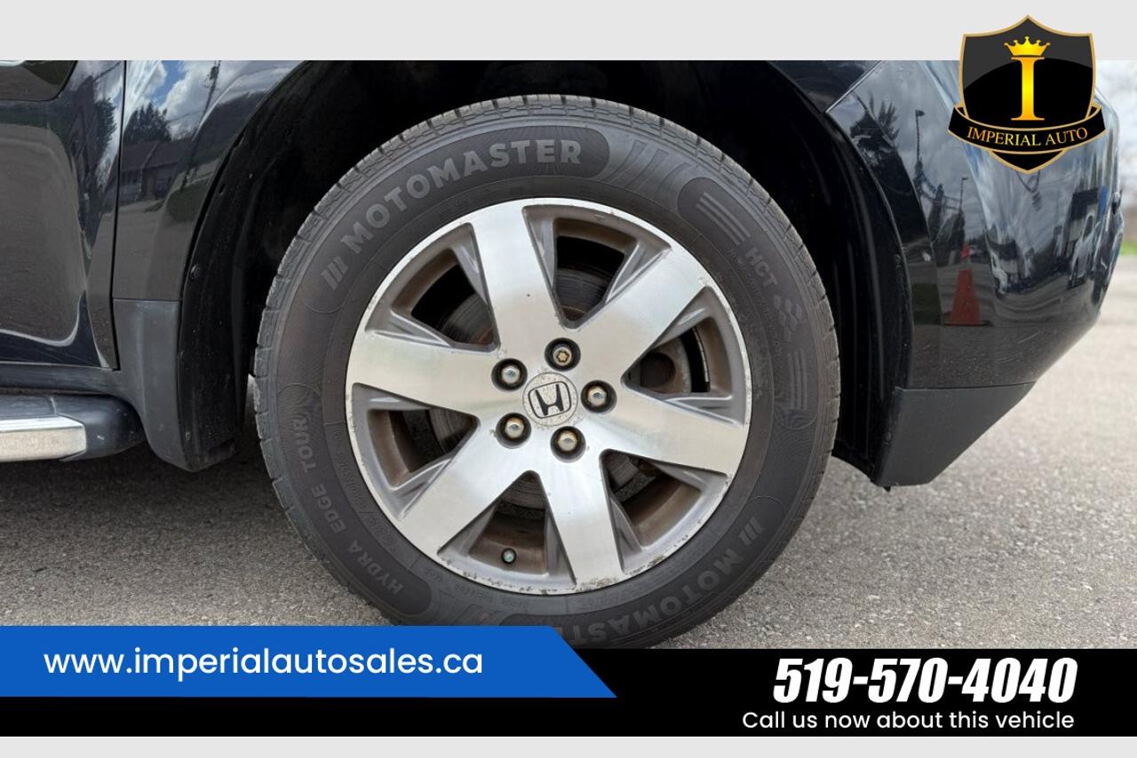 2015 Honda Pilot Touring-8 Passenger Photo