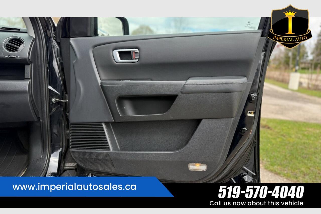 2015 Honda Pilot Touring-8 Passenger Photo