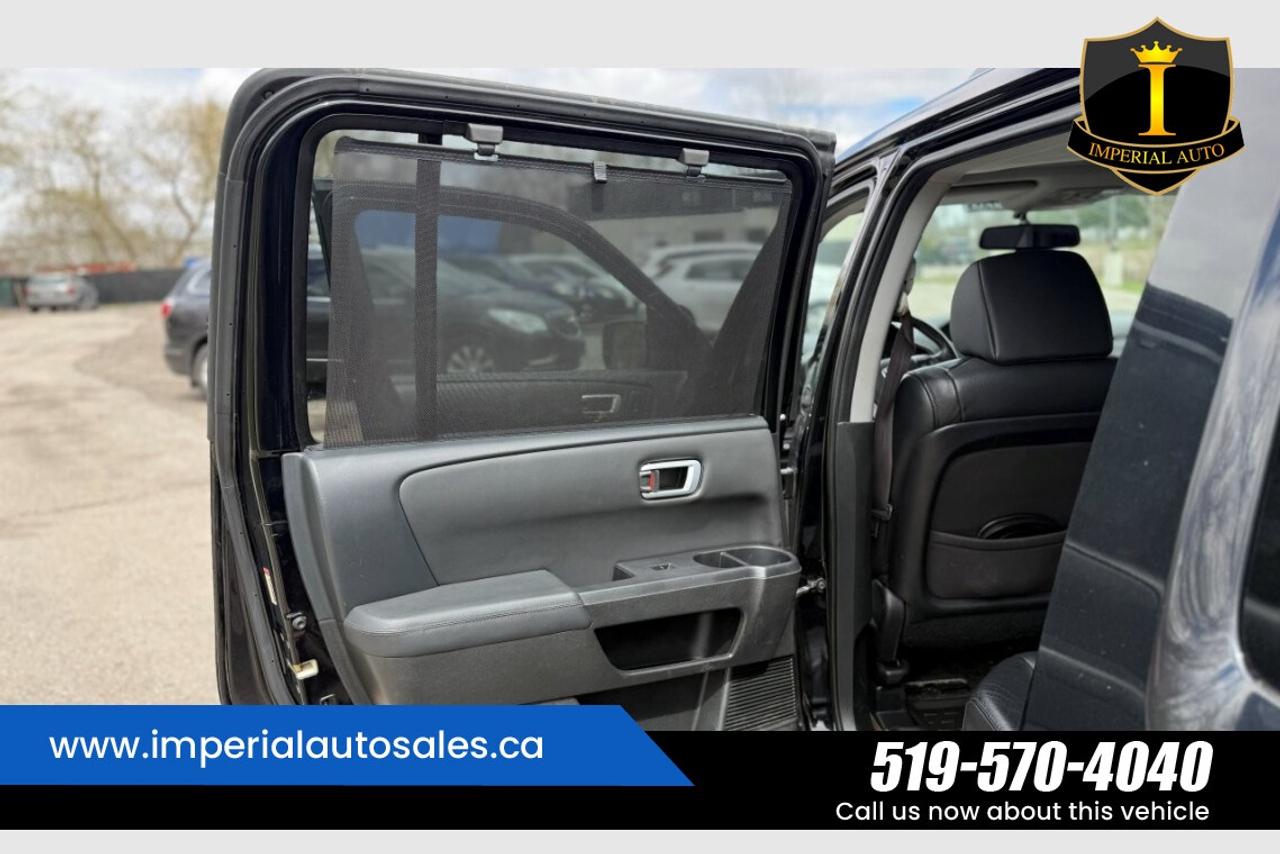 2015 Honda Pilot Touring-8 Passenger Photo