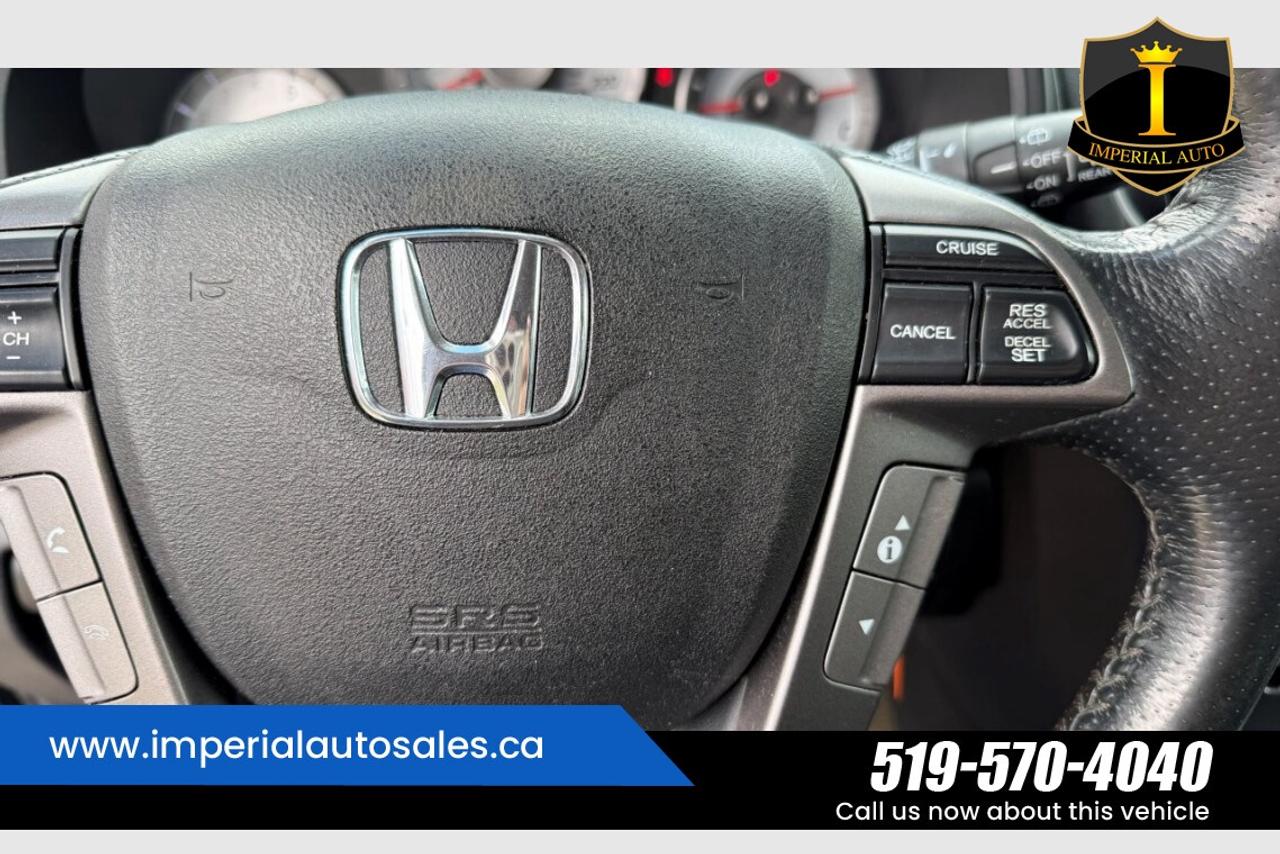 2015 Honda Pilot Touring-8 Passenger Photo