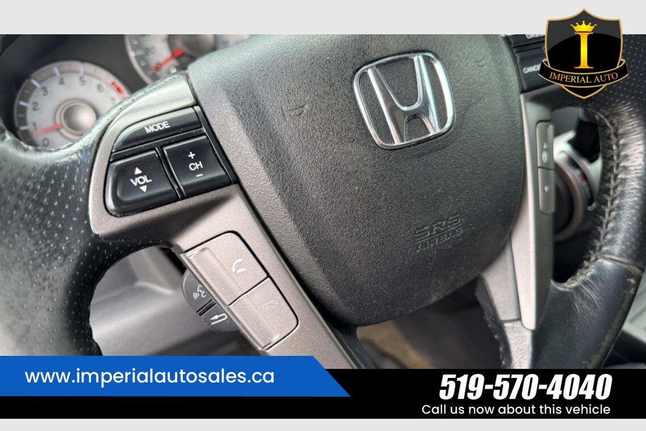 2015 Honda Pilot Touring-8 Passenger Photo