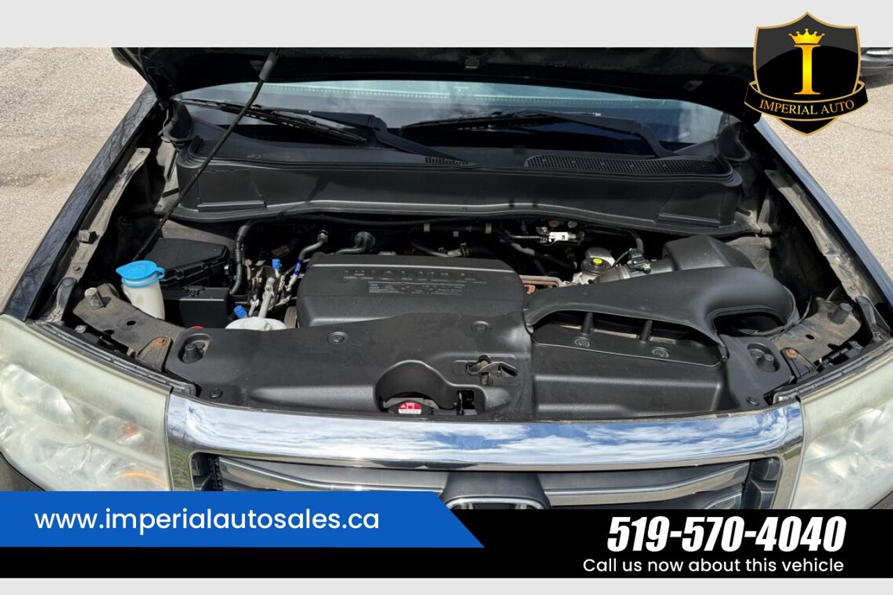 2015 Honda Pilot Touring-8 Passenger Photo