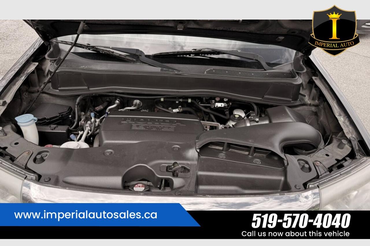 2015 Honda Pilot Touring-8 Passenger Photo