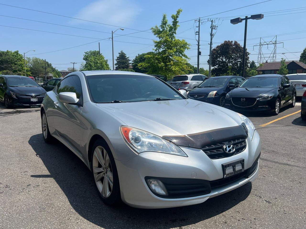 2010 Hyundai Genesis Coupe 2dr I4 Man Premium Photo2