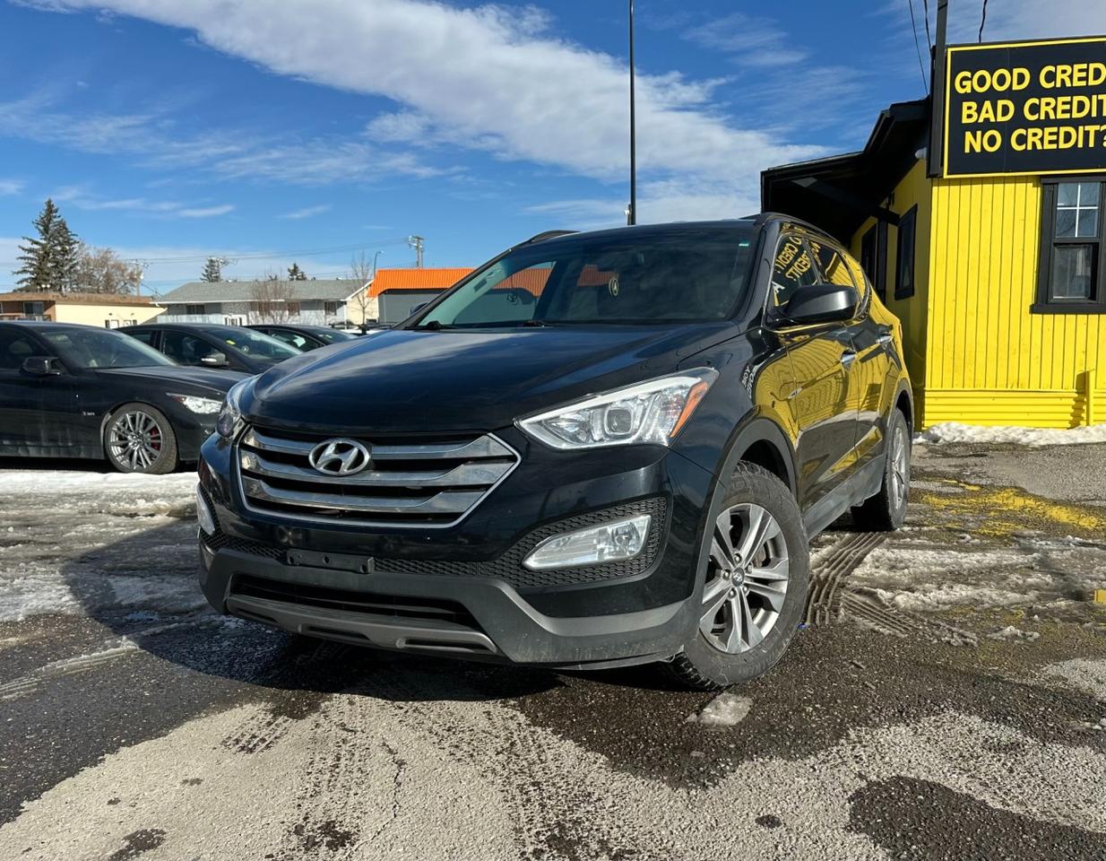 ENJOY VERSATILITY, COMFORT, AND MODERN STYLE WITH THIS 2015 HYUNDAI SANTA FE SPORT PREMIUM. DESIGNED FOR ACTIVE LIFESTYLES, THIS SUV DELIVERS A SMOOTH AND CONFIDENT RIDE WITH RESPONSIVE PERFORMANCE AND A WELL-APPOINTED INTERIOR. STANDARD FEATURES INCLUDE AIR CONDITIONING, POWER WINDOWS AND LOCKS, CRUISE CONTROL, AND ADVANCED SAFETY SYSTEMS LIKE STABILITY CONTROL AND MULTIPLE AIRBAGS FOR PEACE OF MIND ON EVERY DRIVE. WITH ITS SPACIOUS CABIN AND PRACTICAL CARGO CAPACITY, THIS SANTA FE SPORT IS PERFECT FOR DAILY COMMUTES OR WEEKEND GETAWAYS. DON&rsquo;T MISS YOUR CHANCE TO OWN THIS WELL-ROUNDED SUV&mdash;CONTACT US TODAY TO BOOK YOUR TEST DRIVE!<br /><br />AUTO AVENUE IS AN AMVIC LICENSED DEALERSHIP, COMMITTED TO PROVIDING EXCEPTIONAL SERVICE AND QUALITY VEHICLES WITH FLEXIBLE PAYMENT OPTIONS. <br/>