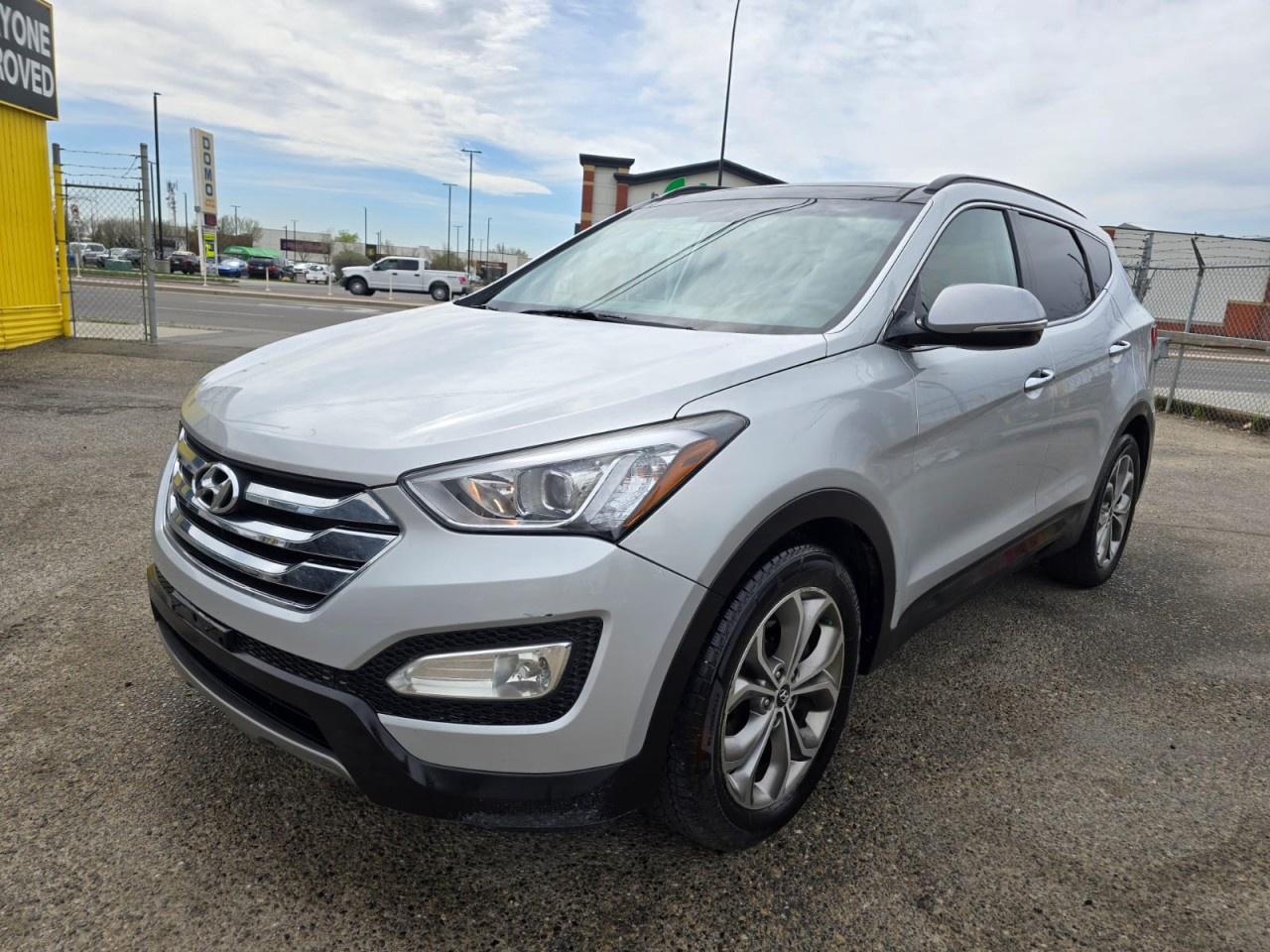 ENJOY PREMIUM COMFORT, REFINED PERFORMANCE, AND EVERYDAY VERSATILITY WITH THIS 2014 HYUNDAI SANTA FE SPORT LIMITED. DESIGNED TO ELEVATE YOUR DRIVE, THIS SUV OFFERS A SMOOTH AND CONFIDENT RIDE WITH A WELL-CRAFTED INTERIOR AND ATTENTION TO DETAIL THROUGHOUT. STANDARD FEATURES INCLUDE AIR CONDITIONING, POWER WINDOWS AND LOCKS, CRUISE CONTROL, AND ADVANCED SAFETY SYSTEMS LIKE STABILITY CONTROL AND MULTIPLE AIRBAGS FOR ADDED PEACE OF MIND. WITH ITS SPACIOUS CABIN AND PRACTICAL CARGO CAPACITY, THIS SANTA FE SPORT IS PERFECT FOR FAMILY LIFE OR WEEKEND ADVENTURES. DON&rsquo;T MISS OUT&mdash;CONTACT US TODAY TO BOOK YOUR TEST DRIVE AND EXPERIENCE IT FOR YOURSELF!<br /><br />AUTO AVENUE IS AN AMVIC LICENSED DEALERSHIP, COMMITTED TO PROVIDING EXCEPTIONAL SERVICE AND QUALITY VEHICLES WITH FLEXIBLE PAYMENT OPTIONS.