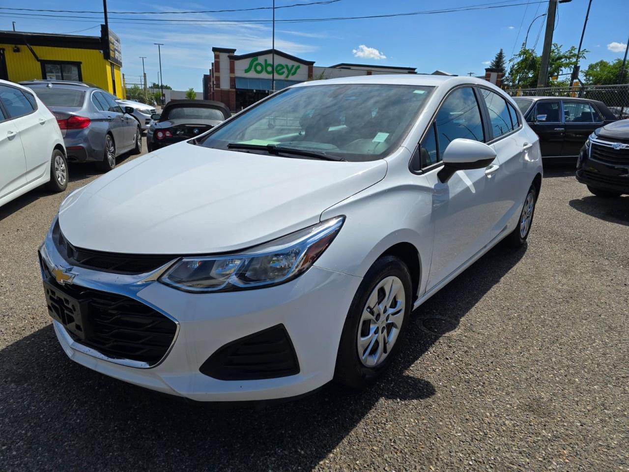 ENJOY RELIABILITY, EFFICIENCY, AND COMFORT WITH THIS 2019 CHEVROLET CRUZE LS. THIS COMPACT SEDAN OFFERS A SMOOTH RIDE, RESPONSIVE HANDLING, AND A WELL-APPOINTED INTERIOR DESIGNED FOR DAILY COMMUTES OR LONGER TRIPS. STANDARD FEATURES INCLUDE AIR CONDITIONING, POWER WINDOWS AND LOCKS, CRUISE CONTROL, AND ADVANCED SAFETY SYSTEMS SUCH AS MULTIPLE AIRBAGS AND STABILITY CONTROL FOR PEACE OF MIND ON EVERY DRIVE. WITH ITS PRACTICAL CARGO SPACE AND COMFORTABLE CABIN, THE CRUZE LS DELIVERS BOTH VALUE AND CONVENIENCE. DON&rsquo;T WAIT&mdash;CONTACT US TODAY TO SCHEDULE YOUR TEST DRIVE AND EXPERIENCE IT FOR YOURSELF!<br /><br />AUTO AVENUE IS AN AMVIC LICENSED DEALERSHIP, COMMITTED TO PROVIDING EXCEPTIONAL SERVICE AND QUALITY VEHICLES WITH FLEXIBLE PAYMENT OPTIONS. <br/>