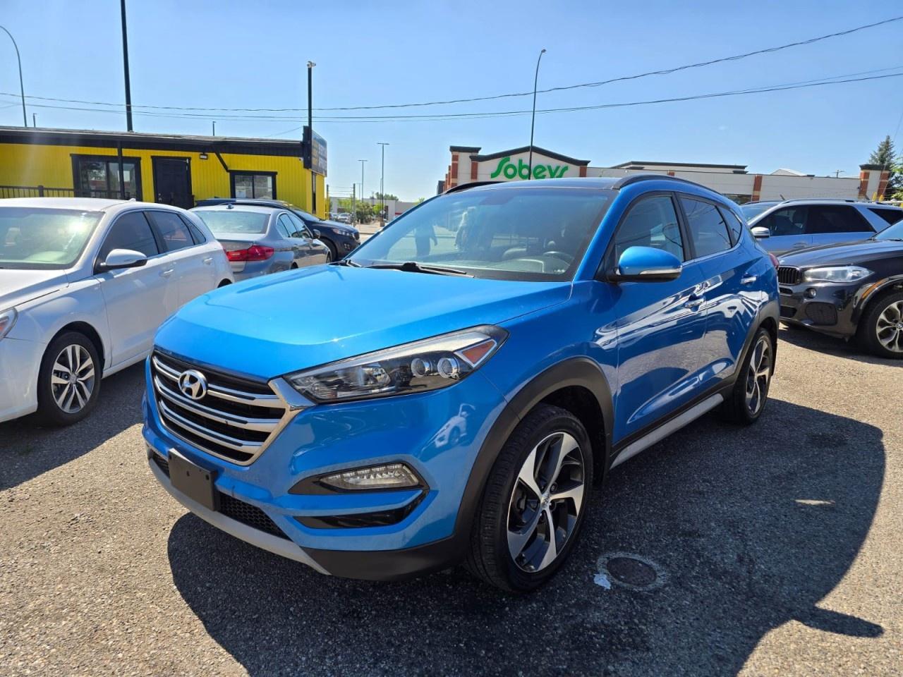 The 2017 Hyundai Tucson Limited is a stylish compact SUV that delivers a premium blend of performance, comfort, and technology. Powered by a 1.6L turbocharged 4-cylinder engine producing 175 horsepower and 195 lb-ft of torque, it offers strong efficiency and responsive driving dynamics. Paired with a 7-speed dual-clutch automatic transmission and available all-wheel drive, the Tucson Limited is a versatile choice for city driving and long-distance travel. <br/> Key Specifications: <br/> Engine Type: 1.6L turbocharged inline-4 <br/> <br/> Horsepower: 175 hp @ 5,500 rpm <br/> <br/> Torque: 195 lb-ft @ 1,500&ndash;4,500 rpm <br/> <br/> Transmission: 7-speed dual-clutch automatic <br/> <br/> Drivetrain: Front-wheel drive / available all-wheel drive <br/> <br/> Fuel Economy: ~ 9.9 L/100km city / 8.5 L/100km highway <br/> <br/> Seating Capacity: 5 passengers <br/> <br/> Features: <br/> 8-inch touchscreen infotainment system with navigation <br/> <br/> Apple CarPlay and Android Auto compatibility <br/> <br/> Bluetooth hands-free connectivity <br/> <br/> USB and auxiliary inputs <br/> <br/> Premium leather seating <br/> <br/> Heated and ventilated front seats <br/> <br/> Heated rear seats and heated steering wheel <br/> <br/> Dual-zone automatic climate control <br/> <br/> Panoramic sunroof <br/> <br/> Power liftgate <br/> <br/> Blind-spot detection and rear cross-traffic alert <br/> <br/> 19-inch alloy wheels <br/> <br/> Advanced safety features including rearview camera, stability control, traction control, and multiple airbags <br/> <br/> AUTO AVENUE IS AN AMVIC LICENSED DEALERSHIP, COMMITTED TO PROVIDING EXCEPTIONAL SERVICE AND QUALITY VEHICLES WITH FLEXIBLE PAYMENT OPTIONS. <br/> Call us at (403) 477-7432<br /> Email: sales@autoavenue.com<br /> Visit us at 1739 51 Street Southeast, Calgary, AB T2A 1T2 <br/> AUTO AVENUE: Your Destination for Quality Cars and Flexible Payments.<br /><br />CARFAX <br/>
