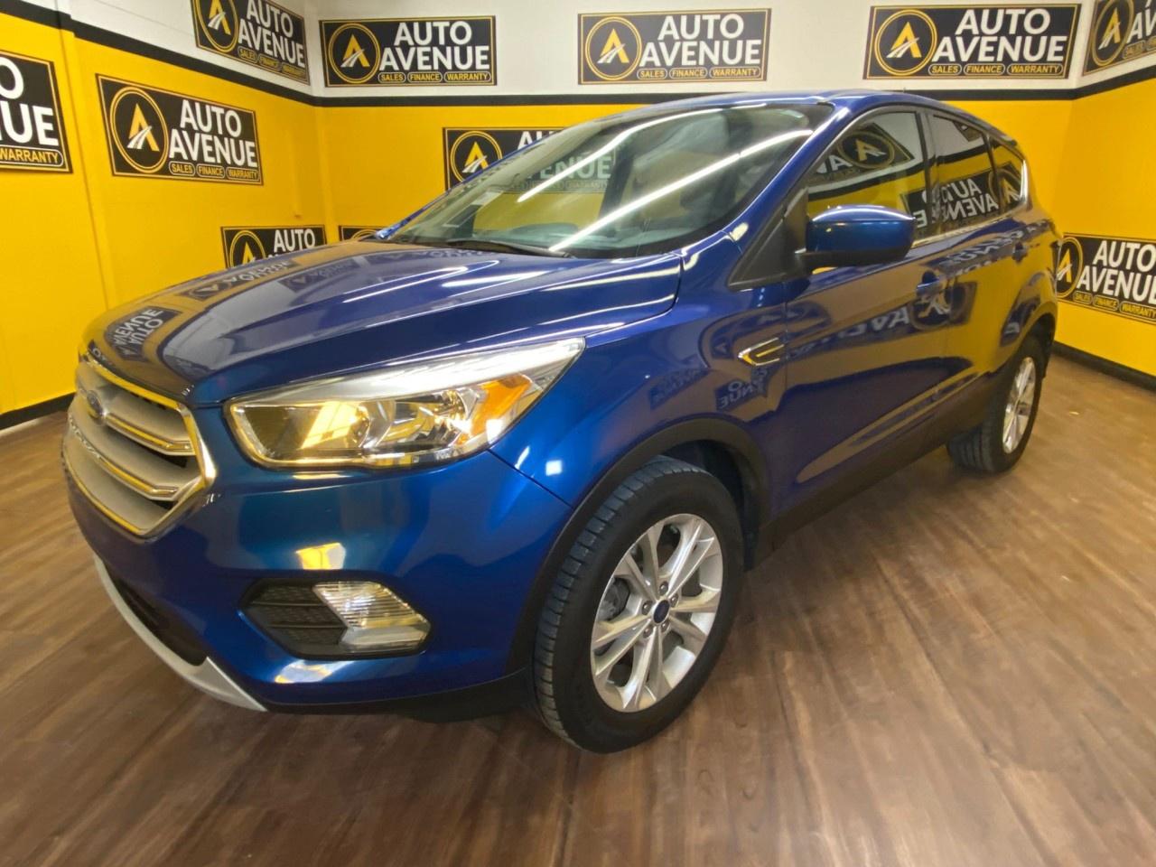 ENJOY VERSATILITY, COMFORT, AND RELIABLE PERFORMANCE WITH THIS 2017 FORD ESCAPE SE. THIS COMPACT SUV OFFERS A SMOOTH RIDE, RESPONSIVE HANDLING, AND A WELL-APPOINTED INTERIOR, MAKING IT PERFECT FOR DAILY COMMUTES OR WEEKEND ADVENTURES. STANDARD FEATURES INCLUDE AIR CONDITIONING, POWER WINDOWS AND LOCKS, CRUISE CONTROL, AND ADVANCED SAFETY SYSTEMS INCLUDING MULTIPLE AIRBAGS AND STABILITY CONTROL FOR PEACE OF MIND ON EVERY DRIVE. WITH ITS SPACIOUS CABIN AND FLEXIBLE CARGO SPACE, THE ESCAPE SE DELIVERS PRACTICALITY AND COMFORT IN ONE PACKAGE. DON&rsquo;T WAIT&mdash;CONTACT US TODAY TO BOOK YOUR TEST DRIVE AND EXPERIENCE IT FOR YOURSELF!<br /><br />AUTO AVENUE IS AN AMVIC LICENSED DEALERSHIP, COMMITTED TO PROVIDING EXCEPTIONAL SERVICE AND QUALITY VEHICLES WITH FLEXIBLE PAYMENT OPTIONS. <br/>