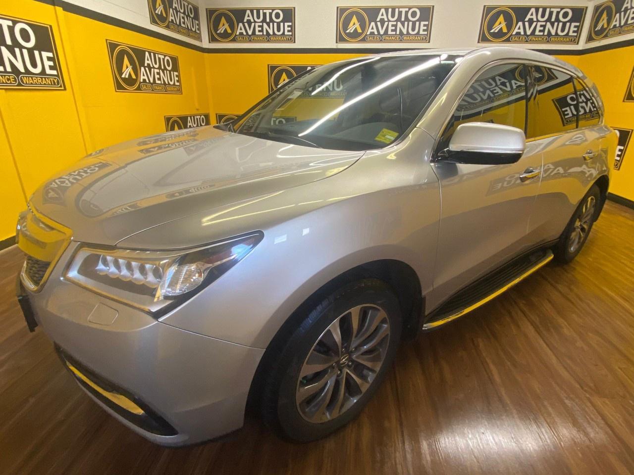 Pre-Owned 2014 Acura MDX SH-AWD w/Tech Package<br />The 2014 Acura MDX SH-AWD with the Technology Package added luxury and safety features to the base model, including 19-inch alloy wheels, the Acura Navigation System, a 10-speaker Acura/ELS Studio audio system, Blind Spot Information, Forward Collision Warning, and Lane Departure Warning systems. Key interior features included perforated Milano leather and a Keyless Access System for all four doors. <br />Key Features of the Technology Package<br />19-inch Alloy Wheels: Upgraded wheels from the standard 18-inch on the base model. <br />Acura Navigation System with Voice Recognition&trade;: An integrated navigation system for guidance. <br />Acura/ELS&reg; Studio Audio System: A 10-speaker, 501-watt premium audio system. <br />Blind Spot Information (BSI) System: A safety feature that warns the driver of vehicles in the blind spot. <br />Forward Collision Warning (FCW): Auditory and visual alerts for potential frontal collisions. <br />Lane Departure Warning (LDW): Alerts the driver if the vehicle is drifting out of its lane. <br />Perforated Milano Leather-Trimmed Interior: High-quality, perforated leather upholstery. <br />Keyless Access System for all Four Doors: Allows keyless entry to all doors, not just the front ones. <br />Other Notable Features <br />Jewel Eye&trade; LED Headlights: The signature LED headlight system for powerful illumination.<br />Premium Milano Leather-Trimmed Interior: The Technology package added the premium leather.<br />Sunroof/Moonroof: A powered sunroof for an open-air feeling.<br />Keyless Entry and Ignition: Easy access and starting with the key fob.<br />Multi-Angle Rear View Camera: Enhances safety and helps with parking.<br />Power Liftgate: Convenient for loading cargo.<br />Heated Front Seats: For comfort in colder weather.<br />Power Driver Seat with Memory: Adjusts for multiple drivers.<br />Bluetooth HandsFreeLink&reg;: For hands-free phone connectivity.<br /> AUTO AVENUE IS AN AMVIC LICENSED DEALERSHIP, COMMITTED TO PROVIDING EXCEPTIONAL SERVICE AND QUALITY VEHICLES WITH FLEXIBLE PAYMENT OPTIONS. <br/> GIVE US A CALL AT (403) 438-8884 OR EMAIL SALES@AUTOAVENUE.COM. WE&rsquo;RE LOCATED AT 211 EAST LAKE CRESCENT NE, AIRDRIE, AB T4A 2H7. <br/> AUTO AVENUE: YOUR DESTINATION FOR QUALITY CARS AND FLEXIBLE PAYMENTS. <br/>