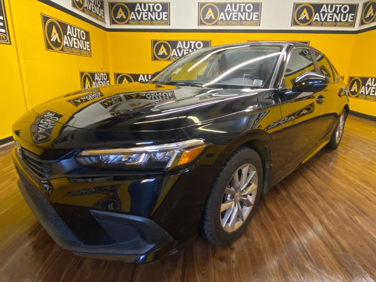 Thank you for visiting another one of Auto Avenue Airdries online listings! Please continue for more information on this 2022 Honda Civic Sedan EX with 64,151km.<br /><br />2022 Honda Civic Sedan EX &ndash; Reliable, Efficient, and Packed with Features<br /><br />Drive in comfort and confidence with this 2022 Honda Civic EX, a sedan that delivers a perfect mix of reliability, performance, and modern technology. With only 64,151 km, this Civic has been well cared for and fully inspected, ready for its next owner.<br /><br />Powered by a 2.0L DOHC 16-Valve i-VTEC 4-cylinder engine and smooth automatic CVT transmission, it offers impressive fuel efficiency and a refined driving experience. The Front Wheel Drive setup ensures excellent handling and stability for city and highway driving alike.<br /><br />Inside, you&rsquo;ll enjoy a gray premium interior with features like heated seats, sunroof, touchscreen infotainment, Apple CarPlay/Android Auto, dual-zone climate control, and a backup camera.<br /><br />Honda&rsquo;s legendary reputation for safety continues here with Honda Sensing, including lane assist, adaptive cruise control, and collision mitigation braking &mdash; giving you peace of mind on every trip.<br /><br />Finished in sleek black, this Civic EX is the perfect combination of efficiency, comfort, and modern design. The look is unmistakably Honda, the smooth contours and cutting-edge technology of this Honda Civic Sedan EX will definitely turn heads. There is no reason why you shouldnt buy this Honda Civic Sedan EX. It is incomparable for the price and quality. <br/> Youve found the one youve been looking for. Your dream car. Based on the superb condition of this vehicle, along with the options and color, this Honda Civic Sedan EX is sure to sell fast.<br /><br />AUTO AVENUE IS AN AMVIC LICENSED DEALERSHIP, COMMITTED TO PROVIDING EXCEPTIONAL SERVICE AND QUALITY VEHICLES WITH FLEXIBLE PAYMENT OPTIONS.<br /><br />GIVE US A CALL AT (403) 438-8884 OR EMAIL SALES@AUTOAVENUE.COM. WE&rsquo;RE LOCATED AT 211 EAST LAKE CRESCENT NE, AIRDRIE, AB T4A 2H7.<br /><br />AUTO AVENUE: YOUR DESTINATION FOR QUALITY CARS AND FLEXIBLE PAYMENTS. <br/>