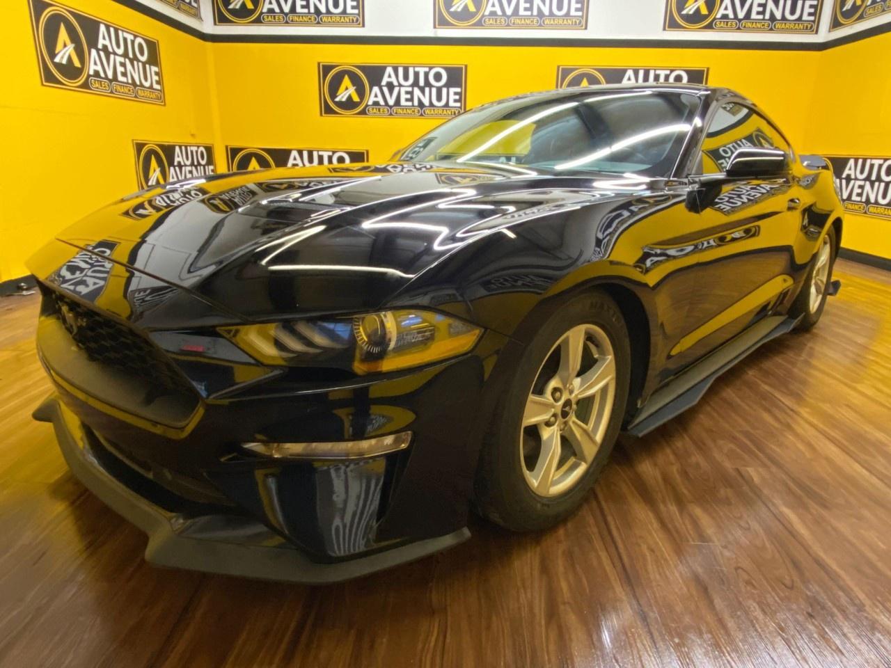 IGNITE YOUR PASSION FOR PERFORMANCE WITH THIS 2019 FORD MUSTANG ECOBOOST TURBOCHARGER, DELIVERING A SPORTY, THRILLING DRIVE BACKED BY EFFICIENT POWER AND AGILE HANDLING. THIS ICONIC AMERICAN MUSCLE CAR COMBINES A TURBOCHARGED ENGINE WITH A BALANCED CHASSIS AND A DRIVERFOCUSED INTERIOR, MAKING EVERY DRIVE EXCITING WHETHER YOU&rsquo;RE HEADED OUT ON THE HIGHWAY OR CRUISING AROUND TOWN. STANDARD FEATURES INCLUDE AIR CONDITIONING, POWER WINDOWS AND LOCKS, CRUISE CONTROL, AND ADVANCED SAFETY SYSTEMS SUCH AS MULTIPLE AIRBAGS AND STABILITY CONTROL FOR PEACE OF MIND ON EVERY DRIVE. WITH ITS STRIKING STYLING AND LEGENDARY BADGE, THE MUSTANG ECOBOOST OFFERS BOTH STYLE AND SUBSTANCE. DON&rsquo;T WAIT&mdash;CONTACT US TODAY TO SCHEDULE YOUR TEST DRIVE AND FEEL THE EXCITEMENT FOR YOURSELF!<br /><br />AUTO AVENUE IS AN AMVIC LICENSED DEALERSHIP, COMMITTED TO PROVIDING EXCEPTIONAL SERVICE AND QUALITY VEHICLES WITH FLEXIBLE PAYMENT OPTIONS. <br/>