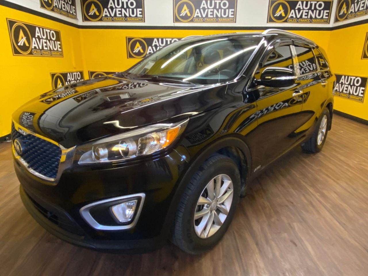 This 2018 Kia Sorento LX is offered to you for sale by Auto Avenue Airdrie.<br /><br />The 2018 Kia Sorento LX is a dependable and versatile all-wheel-drive SUV that&rsquo;s built for Canadian roads. Powered by a 2.4L DOHC 4-cylinder engine and paired with a smooth automatic transmission, it delivers a confident balance of performance and efficiency.<br /><br />Inside, you&rsquo;ll find a spacious and comfortable cabin with gray cloth seats, heated front seats, Bluetooth connectivity, a backup camera, and a user-friendly infotainment system. The Sorento&rsquo;s well-designed interior and quiet ride make it a great choice for families or commuters alike.<br /><br />With its refined styling, practical features, and AWD capability, this Sorento LX offers excellent value and reliability for everyday driving. This SUV is a superb example of what a tough, work focused vehicle should be. Exceptional towing, acceleration and torque will help you get the job done. This Kia Sorento LX is equipped with AWD for improved handling. Whether youre faced with inclement weather or just out enjoying the twisting back road, youll have the grip of AWD on your side. <br/> There is no reason why you shouldnt buy this Kia Sorento LX. It is incomparable for the price and quality. This is about the time when youre saying it is too good to be true, and let us be the ones to tell you, it is absolutely true. <br/> AUTO AVENUE IS AN AMVIC LICENSED DEALERSHIP, COMMITTED TO PROVIDING EXCEPTIONAL SERVICE AND QUALITY VEHICLES WITH FLEXIBLE PAYMENT OPTIONS. <br/> GIVE US A CALL AT (403) 438-8884 OR EMAIL SALES@AUTOAVENUE.COM. WE&rsquo;RE LOCATED AT 211 EAST LAKE CRESCENT NE, AIRDRIE, AB T4A 2H7. <br/> AUTO AVENUE: YOUR DESTINATION FOR QUALITY CARS AND FLEXIBLE PAYMENTS. <br/>