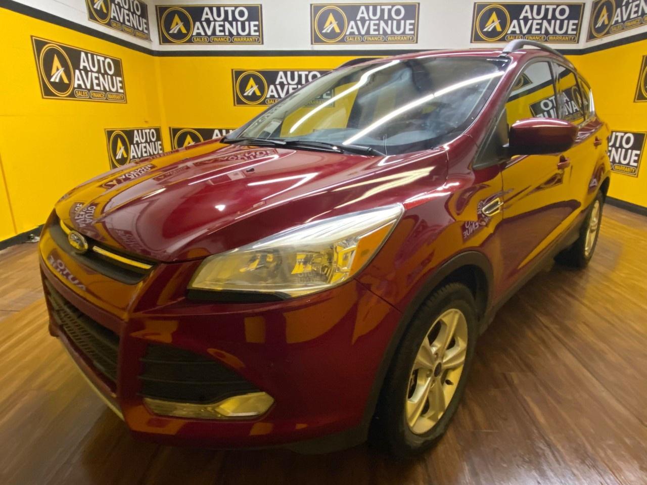 Auto Avenue Airdrie is honored to present a wonderful example of pure vehicle design... this 2016 Ford Escape SE only has 114,491km on it and could potentially be the vehicle of your dreams!<br /><br />This 2016 Ford Escape SE AWD delivers the perfect balance of performance, comfort, and practicality. Powered by a 1.6L EcoBoost engine and equipped with All-Wheel Drive, it&rsquo;s built to handle Alberta&rsquo;s changing seasons with confidence and efficiency.<br /><br />Inside, you&rsquo;ll find a comfortable and spacious cabin with all the features you need for everyday driving &mdash; including heated seats, Bluetooth connectivity, and a backup camera for added convenience.<br /><br />Features & Highlights:<br />- 1.6L EcoBoost 4-Cylinder Engine<br />- Automatic Transmission<br />- All-Wheel Drive<br />- Heated Front Seats<br />- Backup Camera<br />- Bluetooth & Voice Command<br />- Power Windows, Locks & Mirrors<br />- Keyless Entry<br />- Air Conditioning<br />- Cruise Control<br />- Alloy Wheels<br /><br />Reliable, fuel-efficient, and versatile &mdash; this Escape SE is the ideal SUV for city driving or weekend adventures. Come take it for a drive today!<br /> In their original incarnation, SUVs were chiefly owned by folks who valued utility above sport. Not anymore! The Ford Escape SE redefines the SUV and makes the perfect all around family companion. Equipped with 4WD, this Ford Escape SE gives you added confidence to tackle the surface of any path you take. <br/> This 2016 Ford Escape has such low mileage it has been parked more than driven. This is about the time when youre saying it is too good to be true, and let us be the ones to tell you, it is absolutely true.<br /><br />AUTO AVENUE IS AN AMVIC LICENSED DEALERSHIP, COMMITTED TO PROVIDING EXCEPTIONAL SERVICE AND QUALITY VEHICLES WITH FLEXIBLE PAYMENT OPTIONS.<br /><br />GIVE US A CALL AT (403) 438-8884 OR EMAIL SALES@AUTOAVENUE.COM. WE&rsquo;RE LOCATED AT 211 EAST LAKE CRESCENT NE, AIRDRIE, AB T4A 2H7.<br /><br />AUTO AVENUE: YOUR DESTINATION FOR QUALITY CARS AND FLEXIBLE PAYMENTS. <br/>
