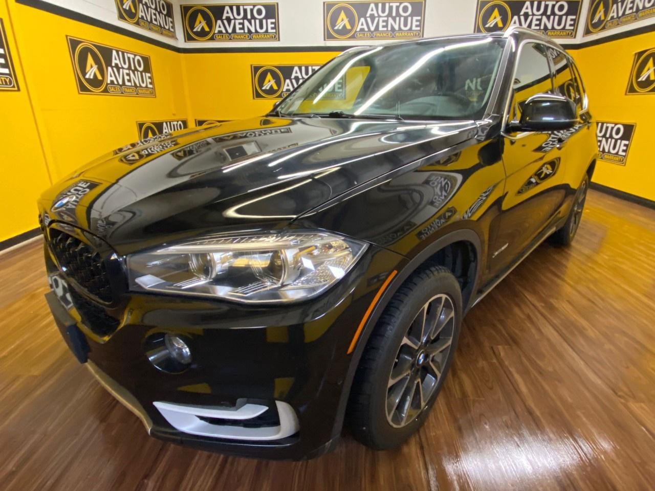 Auto Avenue Airdrie is proud to present this well-equipped 2017 BMW X5 xDrive35i &mdash; a luxury SUV that blends strong performance with premium comfort and smart all-weather capability.<br /><br />As a compact SUV, this vehicle packs all the performance of a full-size into a package that easily navigates the urban terrain. Todays luxury vehicle is not just about opulence. Its about a perfect balance of performance, comfort and attention to detail. This 2017 BMW X5 xDrive35i is the perfect example of the modern luxury. <br/> This vehicle has an added performance bonus: AWD. It improves handling on those winding back roads, and gives you added safety and control when driving through wet and snow weather conditions. With an efficient and easy to use navigation system, this BMW X5 will help get you from Point A to Point B in no time flat.<br /><br />Powered by a 3.0L TwinPower Turbo inline-6 and paired with an automatic transmission, this X5 delivers smooth, responsive power and confident acceleration. BMW&rsquo;s xDrive all-wheel-drive system enhances traction and stability, making it a great choice for Alberta roads year-round.<br /><br />Inside, you&rsquo;ll enjoy a Black leather interior loaded with desirable features, including a panoramic sunroof, heated front seats, and a heated steering wheel for added comfort during colder mornings. The cabin is refined, spacious, and designed with a driver-focused layout typical of BMW craftsmanship.<br /><br />Finished in a sleek Black exterior, this X5 combines luxury styling with everyday practicality. Whether youre looking for a capable family SUV or a refined daily driver with premium touches, this BMW X5 xDrive35i delivers excellent value.<br /><br /><br /> <br/> AUTO AVENUE IS AN AMVIC LICENSED DEALERSHIP, COMMITTED TO PROVIDING EXCEPTIONAL SERVICE AND QUALITY VEHICLES WITH FLEXIBLE PAYMENT OPTIONS. <br/> GIVE US A CALL AT (403) 477-7432 OR EMAIL SALES@AUTOAVENUE.COM. WE&rsquo;RE LOCATED AT 1739 51 STREET SE, CALGARY, AB T2A 1T2. <br/> AUTO AVENUE: YOUR DESTINATION FOR QUALITY CARS AND FLEXIBLE PAYMENTS. <br/>