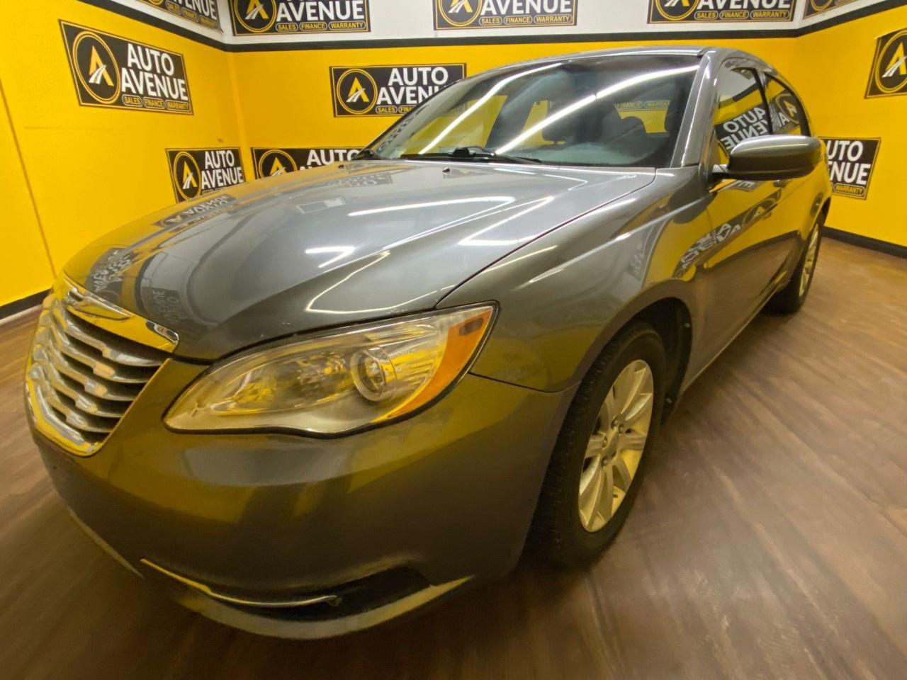 EXPERIENCE COMFORT, RELIABILITY, AND VALUE WITH THIS 2013 CHRYSLER 200 TOURING. DESIGNED FOR SMOOTH EVERYDAY DRIVES AND COMMUTES, THIS WELLROUNDED SEDAN OFFERS A COMFORTABLE INTERIOR, RESPONSIVE HANDLING, AND PRACTICAL PERFORMANCE YOU CAN COUNT ON. STANDARD FEATURES INCLUDE AIR CONDITIONING, POWER WINDOWS AND LOCKS, CRUISE CONTROL, AND ADVANCED SAFETY SYSTEMS SUCH AS MULTIPLE AIRBAGS AND STABILITY CONTROL FOR PEACE OF MIND ON EVERY DRIVE. WITH ITS SPACIOUS CABIN AND USERFRIENDLY DESIGN, THE 200 TOURING DELIVERS COMFORT AND DEPENDABILITY IN ONE PACKAGE. DON&rsquo;T WAIT&mdash;CONTACT US TODAY TO SCHEDULE YOUR TEST DRIVE AND EXPERIENCE IT FOR YOURSELF!<br /><br />AUTO AVENUE IS AN AMVIC LICENSED DEALERSHIP, COMMITTED TO PROVIDING EXCEPTIONAL SERVICE AND QUALITY VEHICLES WITH FLEXIBLE PAYMENT OPTIONS.