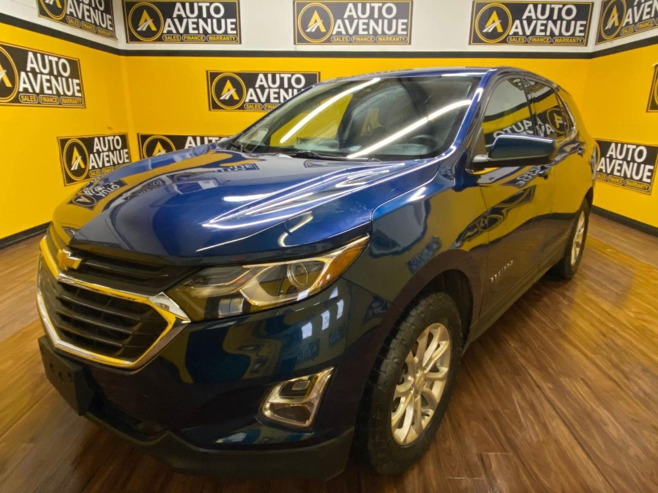 Auto Avenue Airdrie is proud to offer this 2020 Chevrolet Equinox LT, a practical and comfortable AWD SUV designed for everyday reliability and year-round capability.<br /><br />Powered by a 1.5L Turbo 4-cylinder DOHC engine paired with an automatic transmission, the Equinox delivers smooth performance and solid fuel efficiency. All-wheel drive adds confidence on Alberta roads, whether youre tackling winter conditions or weekend trips.<br /><br />Inside, the Equinox LT provides a comfortable and modern cabin with heated front seats, Bluetooth connectivity for hands-free calling and audio streaming, and powered seats for easy adjustment. The grey interior is clean and functional, offering plenty of space for passengers and cargo.<br /><br />Finished in a sharp Blue exterior, this SUV blends style, practicality, and value&mdash;making it a great option for families, commuters, or anyone needing a dependable all-season vehicle.<br /><br />AUTO AVENUE IS AN AMVIC LICENSED DEALERSHIP, COMMITTED TO PROVIDING EXCEPTIONAL SERVICE AND QUALITY VEHICLES WITH FLEXIBLE PAYMENT OPTIONS.<br /><br />GIVE US A CALL AT (403) 438-8884 OR EMAIL SALES@AUTOAVENUE.COM. WE&rsquo;RE LOCATED AT 211 EAST LAKE CRESCENT NE, AIRDRIE, AB T4A 2H7.<br /><br />AUTO AVENUE: YOUR DESTINATION FOR QUALITY CARS AND FLEXIBLE PAYMENTS.