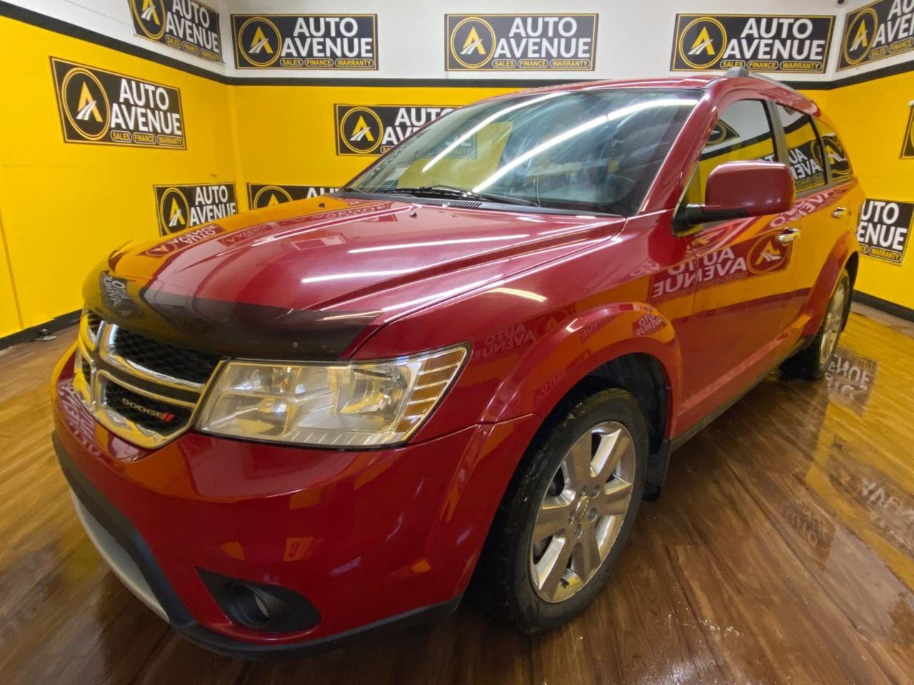 Auto Avenue Airdrie is proud to present this 2015 Dodge Journey R/T &mdash; a practical, comfortable, and well-equipped SUV built to handle family life and Alberta driving with ease.<br /><br />Powered by an automatic transmission and All-Wheel Drive, the Journey R/T offers dependable performance and confident traction year-round. Its versatile interior layout and solid road feel make it a great choice for daily commuting or weekend travel.<br /><br />Inside, the Black interior provides a comfortable and functional space designed around everyday use. The R/T trim adds refinement and convenience, delivering a well-rounded driving experience for anyone needing space, capability, and value.<br /><br />Finished in a striking Red exterior, this Journey stands out with bold styling while staying practical and approachable. With its strong feature set and all-season capability, it remains a smart pick for families or drivers needing extra room without sacrificing comfort.<br /><br />AUTO AVENUE IS AN AMVIC LICENSED DEALERSHIP, COMMITTED TO PROVIDING EXCEPTIONAL SERVICE AND QUALITY VEHICLES WITH FLEXIBLE PAYMENT OPTIONS.<br /><br />GIVE US A CALL AT (403) 438-8884 OR EMAIL SALES@AUTOAVENUE.COM. WE&rsquo;RE LOCATED AT 211 EAST LAKE CRESCENT NE, AIRDRIE, AB T4A 2H7.<br /><br />AUTO AVENUE: YOUR DESTINATION FOR QUALITY CARS AND FLEXIBLE PAYMENTS.