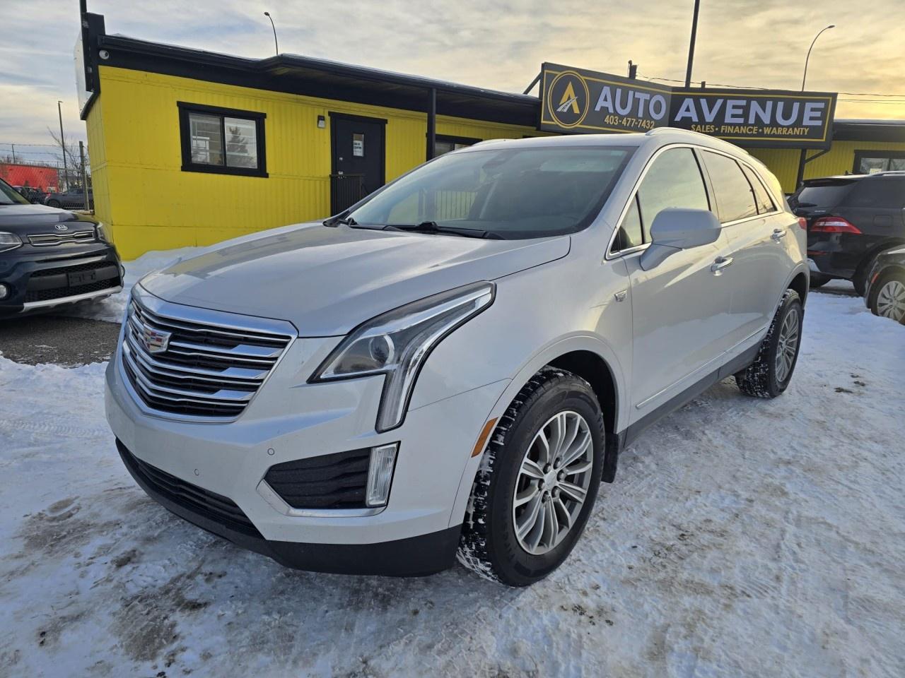 Auto Avenue 17 AVE has a wide selection of exceptional pre-owned vehicles to choose from, including this 2018 Cadillac XT5.<br /> If youre in the market for an incredible SUV &mdash; and value on-the-road comfort and manners more than ultimate off-road capability or towing strength &mdash; youll definitely want to check out this Cadillac XT5 Luxury AWD.<br /> Is it possible to fall in love with a vehicle? It is when your vehicle is as prestigious as the Cadillac XT5. <br/> Few vehicles can match the safety and comfort of this AWD Cadillac XT5 Luxury. With enhanced performance, a refined interior, and exceptional fuel efficiency, this Cadillac is in a class of its own. Driven by many but adored by more, the Cadillac XT5 Luxury AWD is a perfect addition to any home. <br/> ADDITIONALLY, THIS VEHICLE FEATURES: <br/> Leather seats <br/> <br/> Full panoramic glass roof <br/> <br/> Backup camera with touchscreen display <br/> <br/> A luxury SUV in excellent condition <br/> <br/> <br /><br /> AUTO AVENUE IS AN AMVIC LICENSED DEALERSHIP, COMMITTED TO PROVIDING EXCEPTIONAL SERVICE AND QUALITY VEHICLES WITH FLEXIBLE PAYMENT OPTIONS. <br/> GIVE US A CALL AT (403) 477-7432 OR EMAIL SALES@AUTOAVENUE.COM. WE&rsquo;RE LOCATED AT 1739 51 STREET SE, CALGARY, AB T2A 1T2. <br/> AUTO AVENUE: YOUR DESTINATION FOR QUALITY CARS AND FLEXIBLE PAYMENTS. <br/>