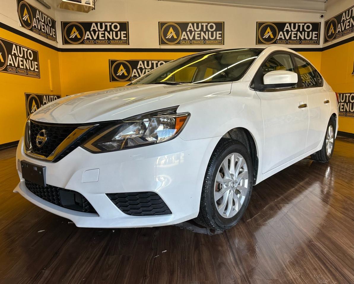 Auto Avenue 17th Ave is proud to present this outstanding example of refined design &mdash; a 2019 Nissan Sentra SV with only 71,559 km. This could be the vehicle you&rsquo;ve been waiting for. <br/> This Sentra has clearly been well cared for, showing low mileage and maintaining a showroom-quality appearance. Smooth, efficient, and comfortable, it&rsquo;s an ideal choice for both daily commuting and longer drives. <br/> The quintessential Nissan, the Sentra SV reflects a commitment to quality, reliability, and thoughtful design. Its modern styling and well-balanced performance make it a standout in its class. <br/> If you&rsquo;re searching for a vehicle that delivers dependability, comfort, and value, you can finally stop looking &mdash; you&rsquo;ve found the one. <br/> Reliable. Efficient. Refined. Nissan. | Auto Avenue 17th Ave<br /><br /> <br/> AUTO AVENUE IS AN AMVIC LICENSED DEALERSHIP, COMMITTED TO PROVIDING EXCEPTIONAL SERVICE AND QUALITY VEHICLES WITH FLEXIBLE PAYMENT OPTIONS. <br/> GIVE US A CALL AT (403) 477-7432 OR EMAIL SALES@AUTOAVENUE.COM. WE&rsquo;RE LOCATED AT 1739 51 STREET SE, CALGARY, AB T2A 1T2. <br/> AUTO AVENUE: YOUR DESTINATION FOR QUALITY CARS AND FLEXIBLE PAYMENTS. <br/> <br/>