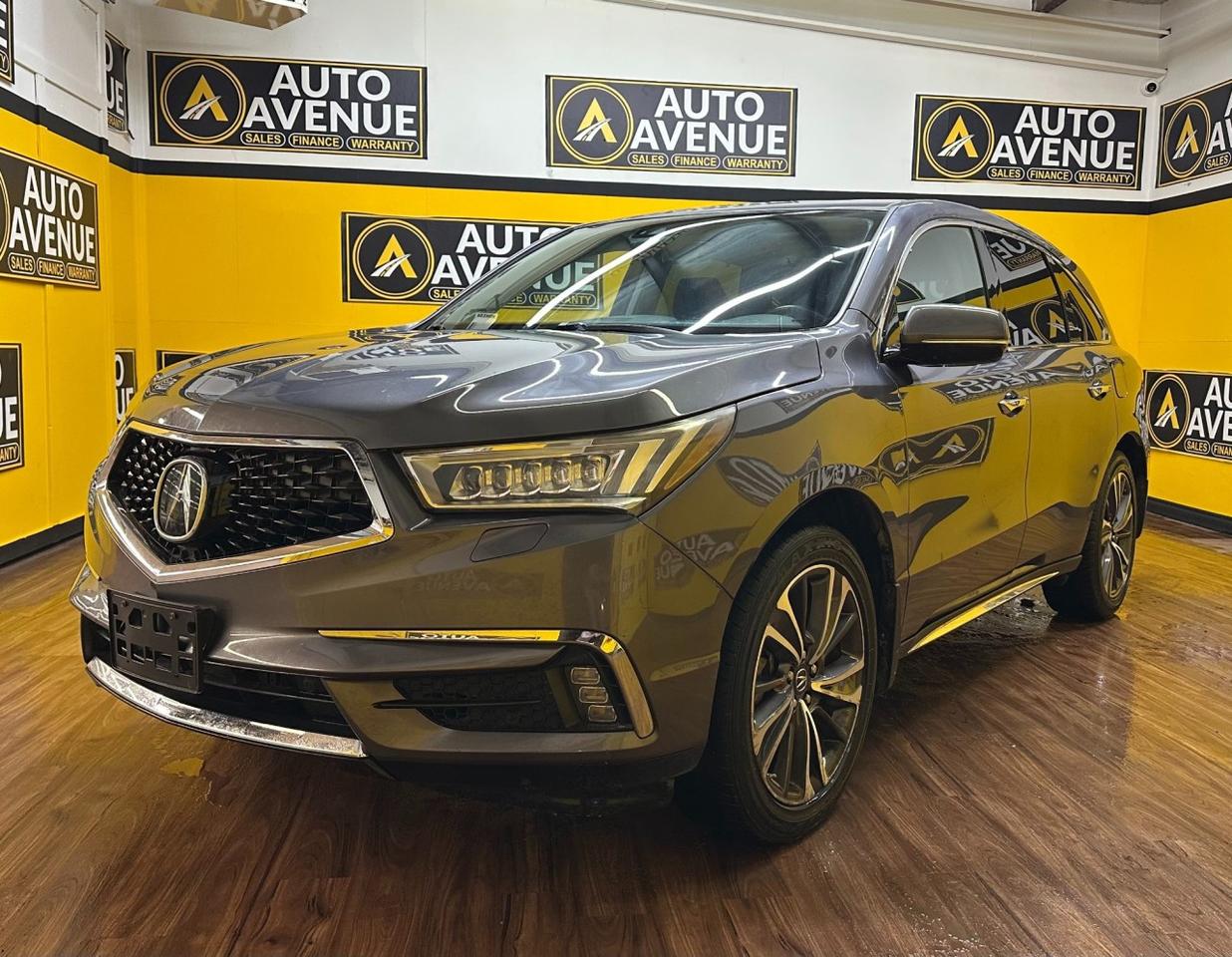 Check out this impressive pre-owned 2020 Acura MDX Tech Plus that has just arrived in our inventory. <br/> The Acura MDX Tech Plus delivers outstanding versatility thanks to its advanced technology, refined styling, and family-friendly design. Sporty yet sophisticated, this SUV injects confident handling and engaging performance into a spacious, elevated driving position. It&rsquo;s the perfect choice for discerning drivers who expect comfort, capability, and premium quality in one exceptional vehicle. <br/> Equipped with Acura&rsquo;s advanced AWD system, this MDX handles beautifully in all road and weather conditions. The benefits of all-wheel drive include enhanced traction, superior stability, and confident acceleration, ensuring a smooth and secure driving experience year-round. <br/> Inside, the cabin showcases an unmistakably refined leather interior that adds both luxury and value. Every detail reflects Acura&rsquo;s commitment to quality, making each drive comfortable and enjoyable for both driver and passengers. <br/> Treat your family to the ultimate driving experience with the super premium entertainment package featured in this MDX Tech Plus&mdash;perfect for road trips and everyday commuting alike. <br/> Performance. Luxury. Confidence. Acura. | Auto Avenue 17th Ave<br /><br /> <br/> AUTO AVENUE IS AN AMVIC LICENSED DEALERSHIP, COMMITTED TO PROVIDING EXCEPTIONAL SERVICE AND QUALITY VEHICLES WITH FLEXIBLE PAYMENT OPTIONS. <br/> GIVE US A CALL AT (403) 477-7432 OR EMAIL SALES@AUTOAVENUE.COM. WE&rsquo;RE LOCATED AT 1739 51 STREET SE, CALGARY, AB T2A 1T2. <br/> AUTO AVENUE: YOUR DESTINATION FOR QUALITY CARS AND FLEXIBLE PAYMENTS. <br/>