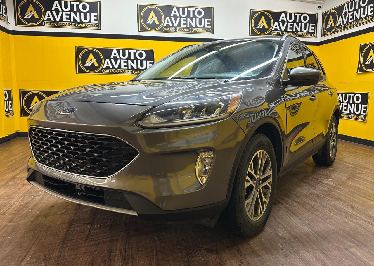 ENJOY VERSATILITY, COMFORT, AND SMOOTH PERFORMANCE WITH THIS 2021 FORD ESCAPE SEL. THIS POPULAR COMPACT SUV OFFERS A SMOOTH RIDE, RESPONSIVE HANDLING, AND A WELLAPPOINTED INTERIOR PERFECT FOR DAILY COMMUTES OR WEEKEND ADVENTURES. STANDARD FEATURES INCLUDE AIR CONDITIONING, POWER WINDOWS AND LOCKS, CRUISE CONTROL, AND ADVANCED SAFETY SYSTEMS SUCH AS MULTIPLE AIRBAGS AND STABILITY CONTROL FOR PEACE OF MIND ON EVERY DRIVE. WITH ITS SPACIOUS CABIN AND FLEXIBLE CARGO SPACE, THE ESCAPE SEL DELIVERS PRACTICALITY AND COMFORT IN ONE WELLROUNDED PACKAGE. DON&rsquo;T WAIT&mdash;CONTACT US TODAY TO SCHEDULE YOUR TEST DRIVE AND EXPERIENCE IT FOR YOURSELF!<br /><br />AUTO AVENUE IS AN AMVIC LICENSED DEALERSHIP, COMMITTED TO PROVIDING EXCEPTIONAL SERVICE AND QUALITY VEHICLES WITH FLEXIBLE PAYMENT OPTIONS. <br/>