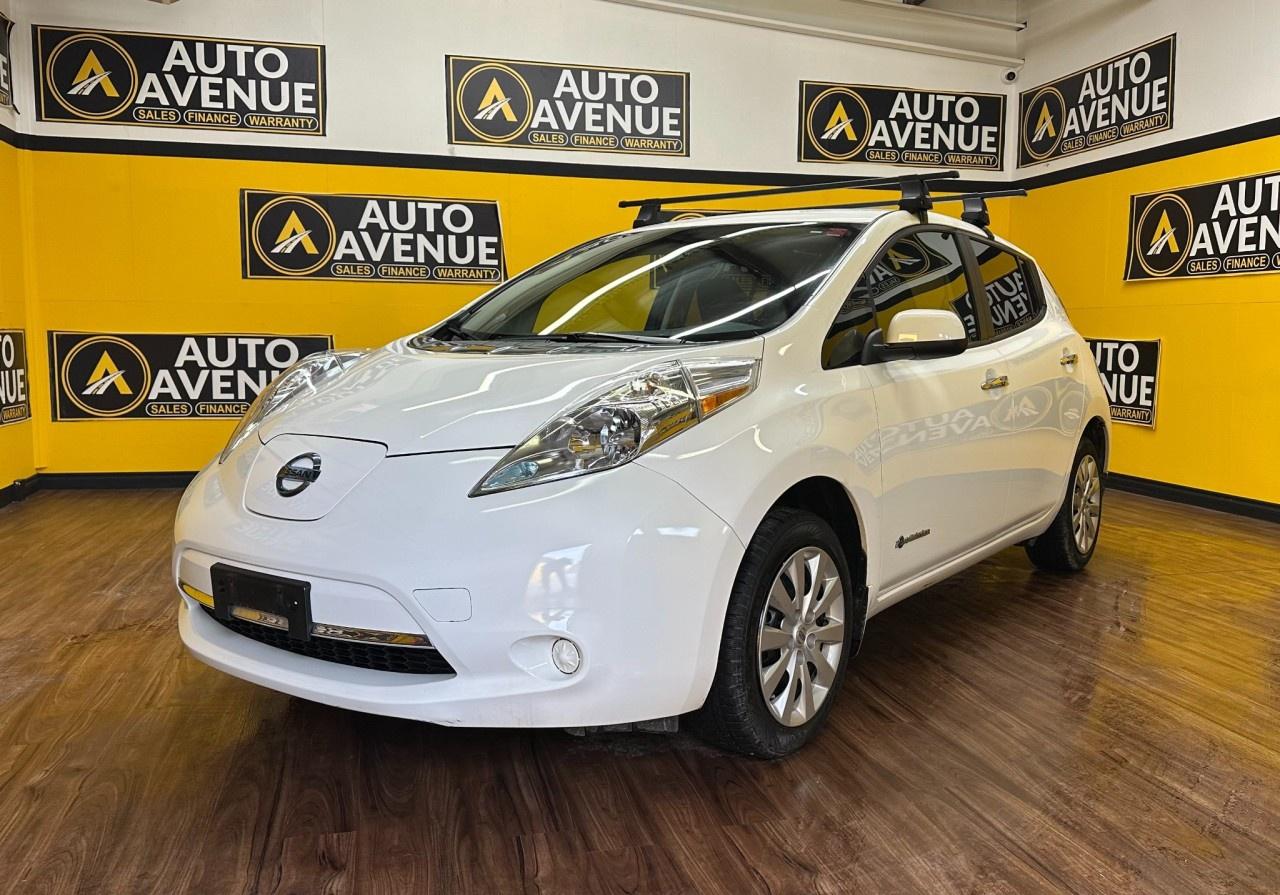 ENJOY EFFICIENT, EMISSIONFREE DRIVING AND COMFORTABLE PERFORMANCE WITH THIS 2015 NISSAN LEAF SL. THIS ALLELECTRIC HATCHBACK OFFERS A SMOOTH, QUIET RIDE, RESPONSIVE HANDLING, AND A WELLAPPOINTED INTERIOR PERFECT FOR DAILY COMMUTES OR CITY DRIVING. STANDARD FEATURES INCLUDE AIR CONDITIONING, POWER WINDOWS AND LOCKS, CRUISE CONTROL, AND ADVANCED SAFETY SYSTEMS SUCH AS MULTIPLE AIRBAGS AND STABILITY CONTROL FOR PEACE OF MIND ON EVERY DRIVE. WITH ITS PRACTICAL CARGO SPACE, SATISFYING ELECTRIC RANGE, AND USERFRIENDLY DESIGN, THE LEAF SL DELIVERS BOTH VALUE AND ECOFRIENDLY CONVENIENCE IN ONE EXCEPTIONAL PACKAGE. DON&rsquo;T WAIT&mdash;CONTACT US TODAY TO SCHEDULE YOUR TEST DRIVE AND EXPERIENCE IT FOR YOURSELF!<br /><br />AUTO AVENUE IS AN AMVIC LICENSED DEALERSHIP, COMMITTED TO PROVIDING EXCEPTIONAL SERVICE AND QUALITY VEHICLES WITH FLEXIBLE PAYMENT OPTIONS. <br/>