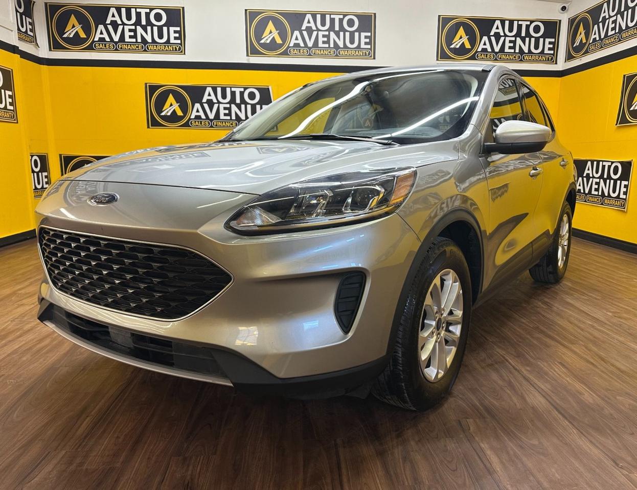 Check out this impressive pre-owned 2022 Ford Escape SE, proudly offered by Auto Avenue Airdrie. <br/> Stylish, versatile, and built for modern driving, the Ford Escape SE blends athletic design with everyday practicality. Its bold exterior lines are complemented by a thoughtfully crafted interior that delivers the comfort, space, and technology today&rsquo;s drivers expect. Whether commuting through the city or heading out on a weekend getaway, this Escape is ready for it all. <br/> Equipped with All-Wheel Drive, this Escape offers enhanced traction, confident handling, and improved stability in all weather conditions. Enjoy sharper control on wet roads, better grip in winter driving, and a smooth, composed ride year-round. <br/> With under 37,061 km on the odometer, this 2022 Escape SE has clearly been well cared for and maintained to a high standard. Its excellent condition, attractive styling, and desirable features make it a standout choice in today&rsquo;s market. <br/> Smart. Capable. Confident. Ford. | Auto Avenue Airdrie<br /><br />AUTO AVENUE IS AN AMVIC LICENSED DEALERSHIP, COMMITTED TO PROVIDING EXCEPTIONAL SERVICE AND QUALITY VEHICLES WITH FLEXIBLE PAYMENT OPTIONS.<br />GIVE US A CALL AT (403) 438-8884 OR EMAIL SALES@AUTOAVENUE.COM<br />WE&rsquo;RE LOCATED AT 211 EAST LAKE CRESCENT NE, AIRDRIE, AB T4A 2H7.<br />AUTO AVENUE: YOUR DESTINATION FOR QUALITY CARS AND FLEXIBLE PAYMENTS. <br/>