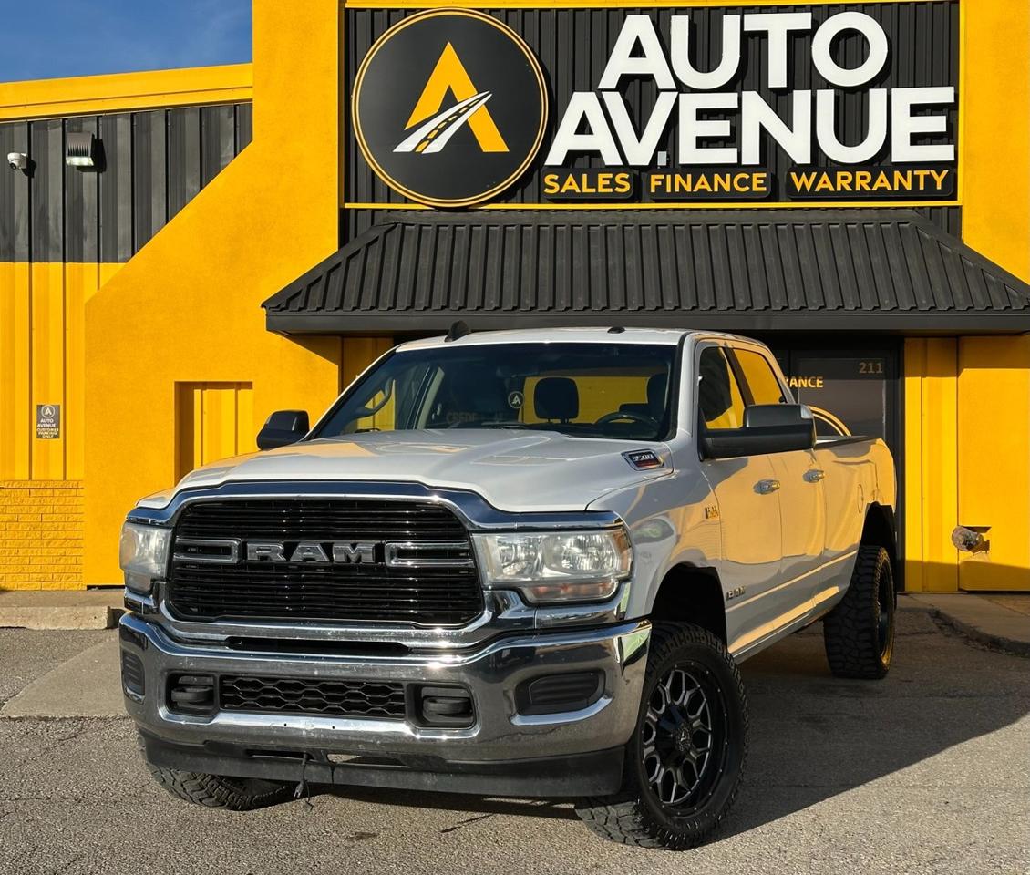Check out this powerful pre-owned 2019 Ram 3500 Big Horn, proudly offered by Auto Avenue Airdrie. <br/> Built to deliver uncompromising strength and capability, the Ram 3500 Big Horn combines heavy-duty performance with refined comfort and modern styling. Whether you need serious towing capability, dependable work-site performance, or a commanding daily driver, this truck is engineered to exceed expectations. <br/> Equipped with a robust 4WD system, this Ram 3500 is ready to tackle challenging terrain and unpredictable weather with confidence. Exceptional traction, impressive stability, and confident handling ensure you stay in control wherever the road-or job-takes you. <br/> Inside, the Big Horn trim offers the perfect blend of rugged durability and premium comfort. Thoughtfully designed features, advanced technology, and spacious seating make every drive productive and enjoyable. This is heavy-duty capability without sacrificing refinement. <br/> Bold. Capable. Unstoppable. Ram. | Auto Avenue Airdrie<br /><br />AUTO AVENUE IS AN AMVIC LICENSED DEALERSHIP, COMMITTED TO PROVIDING EXCEPTIONAL SERVICE AND QUALITY VEHICLES WITH FLEXIBLE PAYMENT OPTIONS.<br />GIVE US A CALL AT (403) 438-8884 OR EMAIL SALES@AUTOAVENUE.COM<br />WE&rsquo;RE LOCATED AT 211 EAST LAKE CRESCENT NE, AIRDRIE, AB T4A 2H7.<br />AUTO AVENUE: YOUR DESTINATION FOR QUALITY CARS AND FLEXIBLE PAYMENTS. <br/>