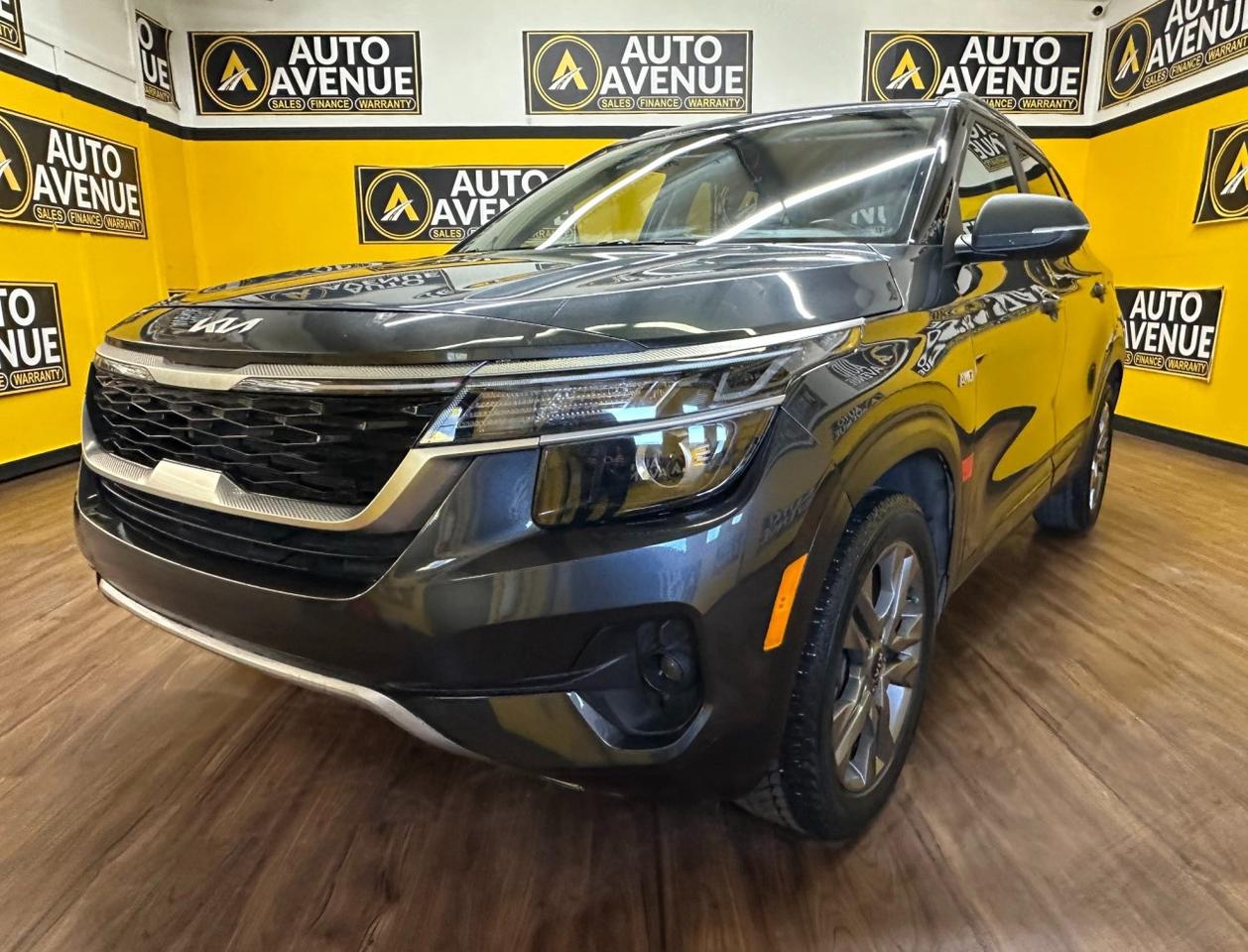 Check out this impressive pre-owned 2022 Kia Seltos that has just arrived in our inventory. <br/> This versatile SUV is the perfect fit for families, professionals, or anyone needing generous cargo space paired with impressive performance. With strong horsepower, smart option upgrades, and bold styling, the Kia Seltos delivers both practicality and excitement in one dynamic package. <br/> Equipped with All-Wheel Drive, you&rsquo;ll enjoy enhanced handling, superior traction, and confident performance in all road and weather conditions. Better control. Better stability. A better driving experience. <br/> Step inside and discover a well-appointed interior featuring premium leather seats, heated front seats, and a power sunroof that brings in natural light and fresh air for an elevated driving experience. Seamless Apple CarPlay integration keeps you connected to your apps, music, navigation, and calls while keeping your focus on the road. <br/> With incredibly low mileage and meticulous upkeep, this Kia Seltos stands out as an exceptional opportunity that won&rsquo;t last long. <br/> Stylish. Capable. Connected. Kia.<br /><br />AUTO AVENUE IS AN AMVIC LICENSED DEALERSHIP, COMMITTED TO PROVIDING EXCEPTIONAL SERVICE AND QUALITY VEHICLES WITH FLEXIBLE PAYMENT OPTIONS.<br />GIVE US A CALL AT (403) 438-8884 OR EMAIL SALES@AUTOAVENUE.COM<br />WE&rsquo;RE LOCATED AT 211 EAST LAKE CRESCENT NE, AIRDRIE, AB T4A 2H7.<br />AUTO AVENUE: YOUR DESTINATION FOR QUALITY CARS AND FLEXIBLE PAYMENTS. <br/>