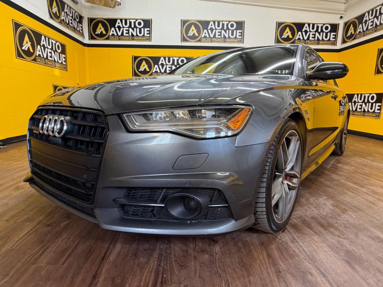 EXPERIENCE ELEGANCE, POWER, AND PRECISION WITH THIS 2017 AUDI A6 3.0T COMPETITION S LINE. THIS LUXURY SEDAN COMBINES A SMOOTH, TURBOCHARGED V6 ENGINE WITH SPORT-TUNED HANDLING AND A REFINED INTERIOR, DELIVERING AN EXHILARATING DRIVE WITH EVERY TURN. STANDARD FEATURES INCLUDE AIR CONDITIONING, POWER WINDOWS AND LOCKS, CRUISE CONTROL, AND ADVANCED SAFETY SYSTEMS SUCH AS MULTIPLE AIRBAGS AND STABILITY CONTROL FOR PEACE OF MIND ON THE ROAD. WITH ITS SOPHISTICATED DESIGN, COMFORTABLE CABIN, AND IMPRESSIVE TECHNOLOGY, THE A6 S LINE STANDS OUT IN BOTH STYLE AND PERFORMANCE. DON&rsquo;T WAIT&mdash;CONTACT US TODAY TO SCHEDULE YOUR TEST DRIVE AND EXPERIENCE IT FIRSTHAND!<br /><br />AUTO AVENUE IS AN AMVIC LICENSED DEALERSHIP, COMMITTED TO PROVIDING EXCEPTIONAL SERVICE AND QUALITY VEHICLES WITH FLEXIBLE PAYMENT OPTIONS. <br/>