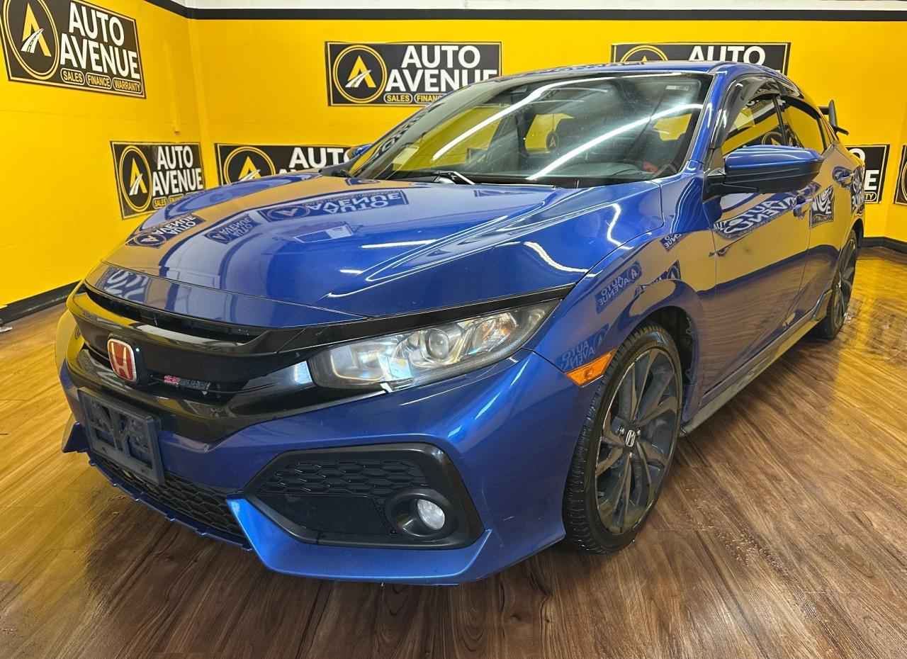 Check out this impressive pre-owned 2019 Honda Civic Hatchback Sport that has just arrived in our inventory. <br/> Sporty, stylish, and incredibly fun to drive, this Civic Hatchback perfectly blends dynamic performance with everyday practicality. Its bold design, smooth body lines, and modern styling make an unmistakable statement on the road. <br/> This vehicle is in excellent mechanical and visual condition, reflecting careful ownership and proper maintenance. Built with Honda&rsquo;s legendary reliability, it delivers the perfect balance of efficiency, responsiveness, and long-term value. <br/> Inside, you&rsquo;ll enjoy a well-designed driver-focused cabin equipped with heated front seats, a power sunroof, and a backup camera for added comfort and convenience. The Sport trim enhances the driving experience with athletic styling details and a confident, composed ride that makes every journey enjoyable - whether commuting through the city or heading out on the highway. <br/> Practical yet exciting. Efficient yet sporty.<br /> Honda Civic Hatchback Sport.<br /><br />AUTO AVENUE IS AN AMVIC LICENSED DEALERSHIP, COMMITTED TO PROVIDING EXCEPTIONAL SERVICE AND QUALITY VEHICLES WITH FLEXIBLE PAYMENT OPTIONS.<br />GIVE US A CALL AT (403) 438-8884 OR EMAIL SALES@AUTOAVENUE.COM<br />WE&rsquo;RE LOCATED AT 211 EAST LAKE CRESCENT NE, AIRDRIE, AB T4A 2H7.<br />AUTO AVENUE: YOUR DESTINATION FOR QUALITY CARS AND FLEXIBLE PAYMENTS. <br/>