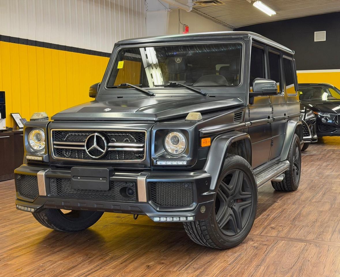 MAKE A POWERFUL STATEMENT WITH THIS 2014 MERCEDES-BENZ G-CLASS G 63 FINISHED IN STRIKING MATTE BLACK. THIS ICONIC LUXURY SUV COMBINES HANDCRAFTED PERFORMANCE WITH A BOLD, TIMELESS DESIGN, DELIVERING AN EXHILARATING DRIVING EXPERIENCE BOTH ON AND OFF THE ROAD. BUILT WITH PRECISION AND ENGINEERED FOR CONFIDENCE, IT OFFERS A COMMANDING PRESENCE, EXCEPTIONAL BUILD QUALITY, AND THE PRESTIGE YOU EXPECT FROM MERCEDES-BENZ. WHETHER CRUISING THE CITY OR TAKING ON TOUGH TERRAIN, THIS G 63 STANDS IN A CLASS OF ITS OWN. <br /><br />AUTO AVENUE IS AN AMVIC LICENSED DEALERSHIP, COMMITTED TO PROVIDING EXCEPTIONAL SERVICE AND QUALITY VEHICLES WITH FLEXIBLE PAYMENT OPTIONS.<br />GIVE US A CALL AT (403) 438-8884 OR EMAIL SALES@AUTOAVENUE.COM<br />WE&rsquo;RE LOCATED AT 211 EAST LAKE CRESCENT NE, AIRDRIE, AB T4A 2H7.<br />AUTO AVENUE: YOUR DESTINATION FOR QUALITY CARS AND FLEXIBLE PAYMENTS.<br /><br />