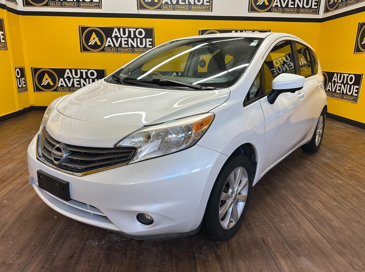 EXPERIENCE PRACTICALITY, COMFORT, AND EFFICIENT PERFORMANCE WITH THIS 2015 NISSAN VERSA NOTE SL. THIS WELLROUNDED HATCHBACK OFFERS A SMOOTH RIDE, RESPONSIVE HANDLING, AND A COMFORTABLE INTERIOR PERFECT FOR DAILY COMMUTES OR WEEKEND ERRANDS. STANDARD FEATURES INCLUDE AIR CONDITIONING, POWER WINDOWS AND LOCKS, CRUISE CONTROL, AND ADVANCED SAFETY SYSTEMS SUCH AS MULTIPLE AIRBAGS AND STABILITY CONTROL FOR PEACE OF MIND ON EVERY DRIVE. WITH ITS PRACTICAL CARGO SPACE, SATISFYING FUEL ECONOMY, AND USERFRIENDLY DESIGN, THE VERSA NOTE SL DELIVERS BOTH VALUE AND RELIABILITY IN ONE WELLROUNDED PACKAGE. DON&rsquo;T WAIT&mdash;CONTACT US TODAY TO SCHEDULE YOUR TEST DRIVE AND EXPERIENCE IT FOR YOURSELF. <br /><br />AUTO AVENUE IS AN AMVIC LICENSED DEALERSHIP, COMMITTED TO PROVIDING EXCEPTIONAL SERVICE AND QUALITY VEHICLES WITH FLEXIBLE PAYMENT OPTIONS. <br/>