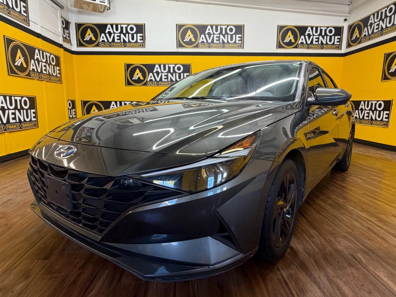 ENJOY MODERN EFFICIENCY, COMFORT, AND EVERYDAY PRACTICALITY WITH THIS 2023 HYUNDAI ELANTRA ESSENTIAL. THIS WELLDESIGNED SEDAN OFFERS A SMOOTH RIDE, RESPONSIVE HANDLING, AND A COMFORTABLE INTERIOR PERFECT FOR DAILY COMMUTES OR WEEKEND DRIVES. STANDARD FEATURES INCLUDE AIR CONDITIONING, POWER WINDOWS AND LOCKS, CRUISE CONTROL, AND ADVANCED SAFETY SYSTEMS SUCH AS MULTIPLE AIRBAGS AND STABILITY CONTROL FOR PEACE OF MIND ON EVERY DRIVE. WITH ITS SATISFYING FUEL ECONOMY, USERFRIENDLY DESIGN, AND GENEROUS CARGO SPACE, THE ELANTRA ESSENTIAL DELIVERS BOTH VALUE AND RELIABILITY IN ONE EXCEPTIONAL PACKAGE. DON&rsquo;T WAIT&mdash;CONTACT US TODAY TO SCHEDULE YOUR TEST DRIVE AND EXPERIENCE IT FOR YOURSELF!<br /><br />AUTO AVENUE IS AN AMVIC LICENSED DEALERSHIP, COMMITTED TO PROVIDING EXCEPTIONAL SERVICE AND QUALITY VEHICLES WITH FLEXIBLE PAYMENT OPTIONS. <br/>