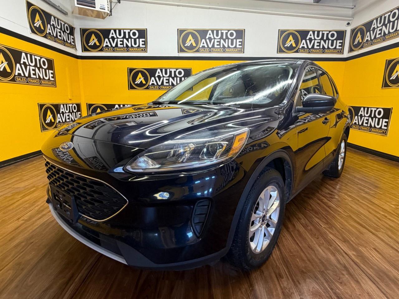 ENJOY VERSATILITY, COMFORT, AND SMOOTH PERFORMANCE WITH THIS 2021 FORD ESCAPE SE. THIS POPULAR COMPACT SUV OFFERS A SMOOTH RIDE, RESPONSIVE HANDLING, AND A WELLAPPOINTED INTERIOR PERFECT FOR DAILY COMMUTES OR WEEKEND ADVENTURES. STANDARD FEATURES INCLUDE AIR CONDITIONING, POWER WINDOWS AND LOCKS, CRUISE CONTROL, AND ADVANCED SAFETY SYSTEMS SUCH AS MULTIPLE AIRBAGS AND STABILITY CONTROL FOR PEACE OF MIND ON EVERY DRIVE. WITH ITS SPACIOUS CABIN AND FLEXIBLE CARGO SPACE, THE ESCAPE SE DELIVERS PRACTICALITY AND COMFORT IN ONE WELLROUNDED PACKAGE. DON&rsquo;T WAIT&mdash;CONTACT US TODAY TO SCHEDULE YOUR TEST DRIVE AND EXPERIENCE IT FOR YOURSELF!<br /><br />AUTO AVENUE IS AN AMVIC LICENSED DEALERSHIP, COMMITTED TO PROVIDING EXCEPTIONAL SERVICE AND QUALITY VEHICLES WITH FLEXIBLE PAYMENT OPTIONS. <br/>