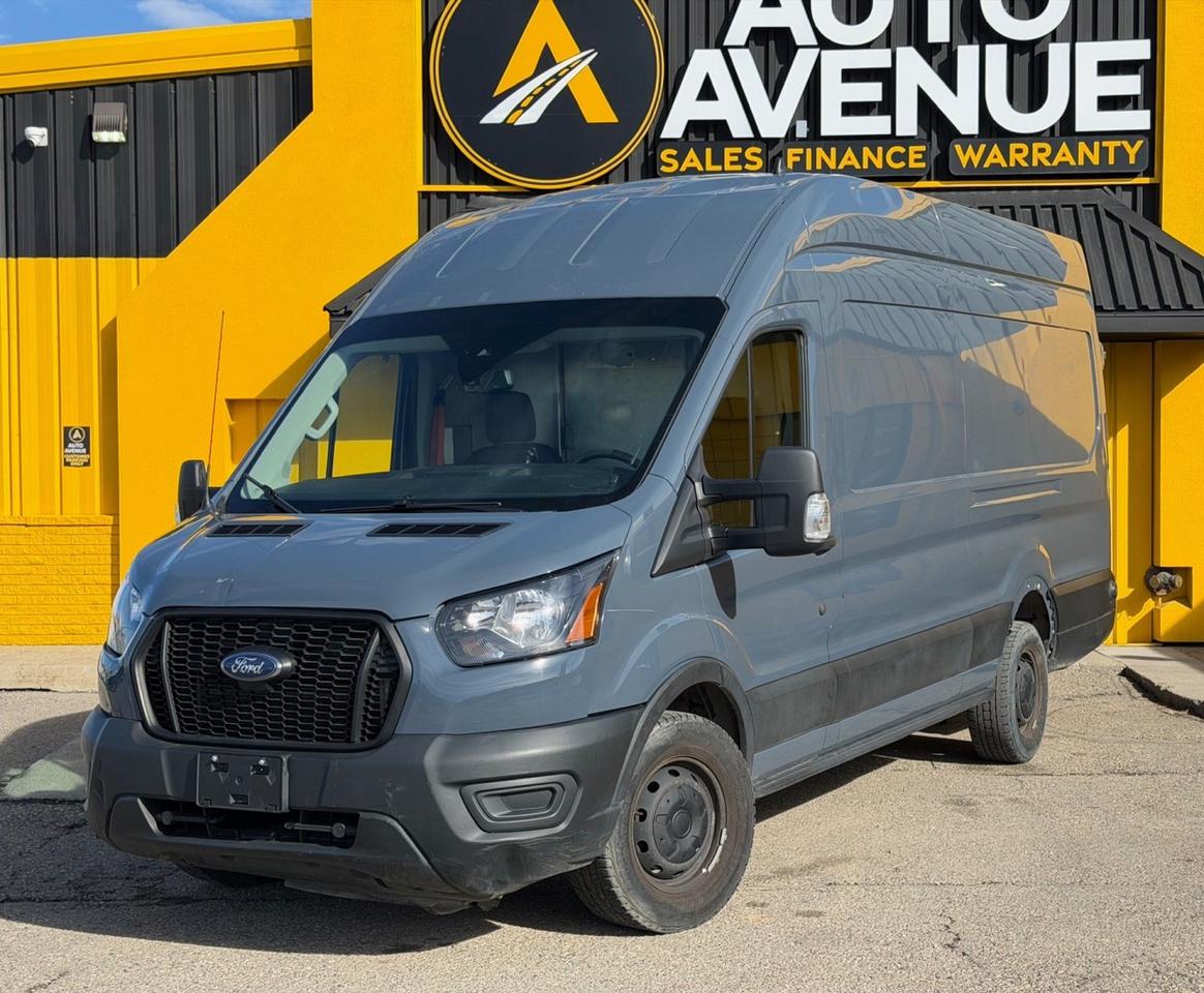 ENJOY PRACTICALITY, RELIABLE PERFORMANCE, AND WORKREADY UTILITY WITH THIS 2021 FORD TRANSIT CARGO VAN T250. THIS SPACIOUS CARGO VAN OFFERS A SMOOTH RIDE, RESPONSIVE HANDLING, AND A FUNCTIONAL INTERIOR PERFECT FOR BUSINESS USE, DELIVERIES, OR TRANSPORTING EQUIPMENT. STANDARD FEATURES INCLUDE AIR CONDITIONING, POWER WINDOWS AND LOCKS, CRUISE CONTROL, AND ADVANCED SAFETY SYSTEMS SUCH AS MULTIPLE AIRBAGS AND STABILITY CONTROL FOR PEACE OF MIND ON EVERY DRIVE. WITH ITS GENEROUS CARGO SPACE, USERFRIENDLY DESIGN, AND DEPENDABLE PERFORMANCE, THE TRANSIT CARGO VAN T250 DELIVERS BOTH VALUE AND VERSATILITY IN ONE CAPABLE PACKAGE. CONTACT US TODAY TO LEARN MORE OR ARRANGE A VIEWING. <br /><br />AUTO AVENUE IS AN AMVIC LICENSED DEALERSHIP, COMMITTED TO PROVIDING EXCEPTIONAL SERVICE AND QUALITY VEHICLES WITH FLEXIBLE PAYMENT OPTIONS. <br/>