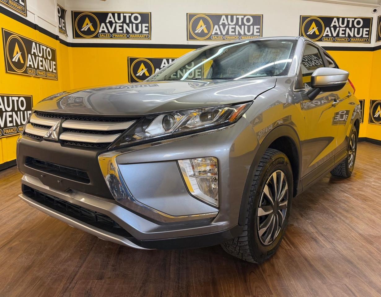 Check out this sporty and versatile pre-owned 2020 Mitsubishi Eclipse Cross ES S-AWC now available at Auto Avenue Airdrie. <br/> The Mitsubishi Eclipse Cross stands out with its bold design, smooth performance, and everyday practicality. Built for Canadian roads, the S-AWC (Super All-Wheel Control) system delivers excellent traction, stability, and confidence in all weather conditions&mdash;whether youre navigating city streets or tackling snow-covered highways. <br/> Inside, this SUV is designed with comfort and convenience in mind. You&rsquo;ll enjoy heated front seats, perfect for cold mornings, while the intuitive layout keeps everything within easy reach for a relaxed driving experience. <br/> Technology adds an extra layer of confidence, with a backup camera that makes reversing and parking easier and safer in tight spaces. It&rsquo;s a practical feature you&rsquo;ll appreciate every day. <br/> Combining sporty styling, dependable capability, and smart features, this 2020 Mitsubishi Eclipse Cross ES S-AWC is a fantastic choice for drivers looking for value and versatility in one package. <br/> Sporty. Confident. Ready for Anything. Mitsubishi. | Auto Avenue Airdrie<br /><br />AUTO AVENUE IS AN AMVIC LICENSED DEALERSHIP, COMMITTED TO PROVIDING EXCEPTIONAL SERVICE AND QUALITY VEHICLES WITH FLEXIBLE PAYMENT OPTIONS.<br /><br />GIVE US A CALL AT (403) 438-8884 OR EMAIL SALES@AUTOAVENUE.COM. WE&rsquo;RE LOCATED AT 211 EAST LAKE CRESCENT NE, AIRDRIE, AB T4A 2H7.<br /><br />AUTO AVENUE: YOUR DESTINATION FOR QUALITY CARS AND FLEXIBLE PAYMENTS. <br/>