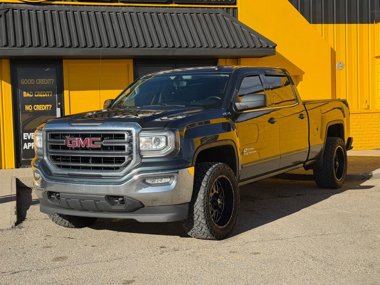 Check out this powerful and dependable pre-owned 2017 GMC Sierra 1500 SLE Kodiak Edition now available at Auto Avenue Airdrie. <br/> The GMC Sierra 1500 is built for drivers who demand strength, capability, and refinement in one package&mdash;and this Kodiak Edition takes it a step further with bold styling and added presence on the road. Known as a special appearance package, the Kodiak Edition typically includes distinctive exterior accents, chrome detailing, and upgraded wheels that give the truck a more aggressive and premium look. <br/> Under the hood, the Sierra 1500 is all about performance and reliability. With its 4WD capability, you&rsquo;ll have the confidence to take on tough terrain, job sites, and harsh Canadian winters with ease. Whether youre towing, hauling, or just commuting, this truck is built to handle it all. <br/> Inside, the SLE trim offers a comfortable and functional cabin with modern features and smart layout. You get a great balance of work-ready durability and everyday comfort, making it just as practical for daily driving as it is for heavy-duty tasks. <br/> The Sierra is also well-known for its strong engine options, smooth ride quality for a pickup, and impressive towing capabilities&mdash;making it a top choice for drivers who need both power and refinement in one truck. <br/> With its bold Kodiak styling, dependable performance, and versatile capability, this 2017 GMC Sierra 1500 SLE Kodiak Edition is ready for whatever comes next. <br/> Bold. Capable. Built to Stand Out. GMC. | Auto Avenue Airdrie<br /><br />AUTO AVENUE IS AN AMVIC LICENSED DEALERSHIP, COMMITTED TO PROVIDING EXCEPTIONAL SERVICE AND QUALITY VEHICLES WITH FLEXIBLE PAYMENT OPTIONS.<br />GIVE US A CALL AT (403) 438-8884 OR EMAIL SALES@AUTOAVENUE.COM<br />WE&rsquo;RE LOCATED AT 211 EAST LAKE CRESCENT NE, AIRDRIE, AB T4A 2H7.<br />AUTO AVENUE: YOUR DESTINATION FOR QUALITY CARS AND FLEXIBLE PAYMENTS.<br /><br /> <br/>