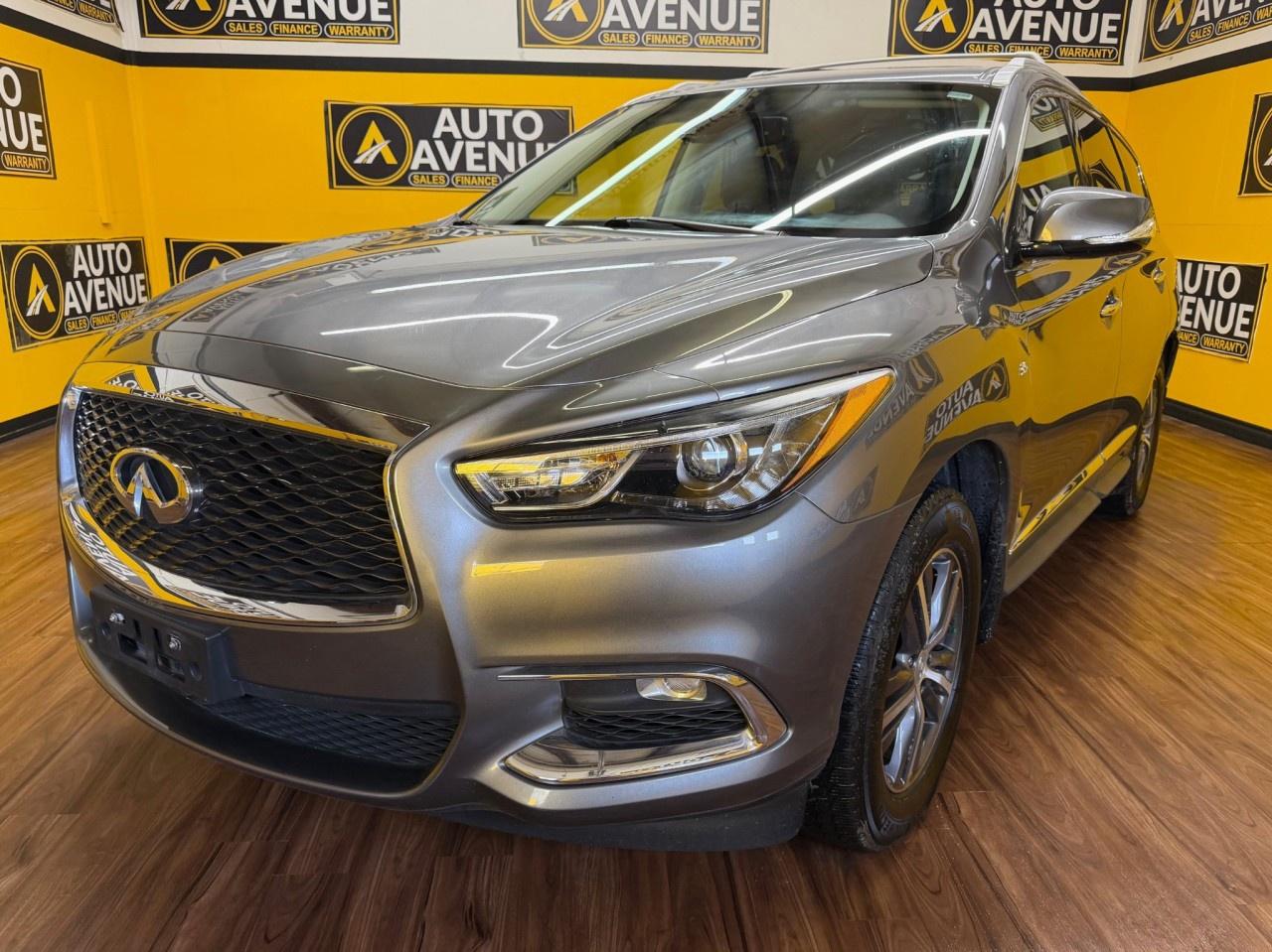 This outstanding example of a 2019 INFINITI QX60 is proudly offered by Auto Avenue Airdrie. <br/> This luxurious 7-passenger SUV delivers the perfect combination of elegance, comfort, and versatility, making it an ideal choice for families and drivers who appreciate refined performance. With its sleek design and premium craftsmanship, the INFINITI QX60 offers a smooth and confident driving experience both in the city and on the open road. <br/> Inside, you&rsquo;ll find a spacious and well-appointed cabin featuring premium leather seating for all seven passengers, ensuring comfort on every journey. The low mileage makes this vehicle an exceptional find, offering both value and long-term reliability. A backup camera adds convenience and safety, making parking and maneuvering effortless. <br/> Equipped with all-wheel drive, this QX60 provides enhanced stability, improved handling, and added confidence in all weather and road conditions. Whether youre navigating daily commutes or heading out on a weekend getaway, this SUV is designed to perform with ease. <br/> A perfect blend of sophistication and practicality - this INFINITI QX60 is more than just an SUV. It&rsquo;s the vehicle your lifestyle deserves!<br /><br />AUTO AVENUE IS AN AMVIC LICENSED DEALERSHIP, COMMITTED TO PROVIDING EXCEPTIONAL SERVICE AND QUALITY VEHICLES WITH FLEXIBLE PAYMENT OPTIONS. <br/>