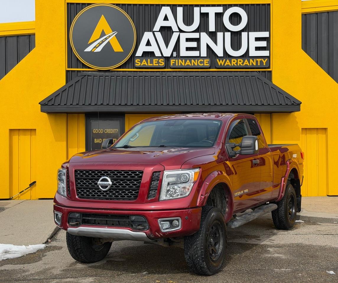 This exceptional example of a 2018 Nissan Titan PRO-4X is proudly offered by Auto Avenue Airdrie. <br/> This powerful and rugged pickup truck perfectly combines durability with refined comfort, making it the ideal choice for both work and adventure. With its bold styling and proven performance, the Nissan Titan PRO-4X stands out as a capable and dependable companion on any terrain. Designed for those who demand strength without sacrificing sophistication, this truck delivers an outstanding driving experience every time you get behind the wheel. <br/> Equipped with 4WD, this Titan PRO-4X is ready to take you far beyond the pavement, offering confidence and control in all conditions. This particular vehicle has been enhanced with a professionally installed lift kit, giving it an even more commanding presence and improved off-road capability. <br/> Inside, you&rsquo;ll find a well-appointed cabin featuring premium leather heated seats, a heated steering wheel, and an intuitive navigation system to keep you comfortable and on track wherever your journey leads. A 360-degree backup camera system provides added safety and convenience, making parking and maneuvering easier than ever. <br/> With low mileage and a history of excellent care, this Nissan Titan PRO-4X is a rare find that perfectly balances performance, comfort, and versatility. <br/> A truly impressive example of strength and refinement - this Nissan Titan PRO-4X is more than just a truck. It&rsquo;s the vehicle you&rsquo;ve been searching for!<br /><br />AUTO AVENUE IS AN AMVIC LICENSED DEALERSHIP, COMMITTED TO PROVIDING EXCEPTIONAL SERVICE AND QUALITY VEHICLES WITH FLEXIBLE PAYMENT OPTIONS. <br/>