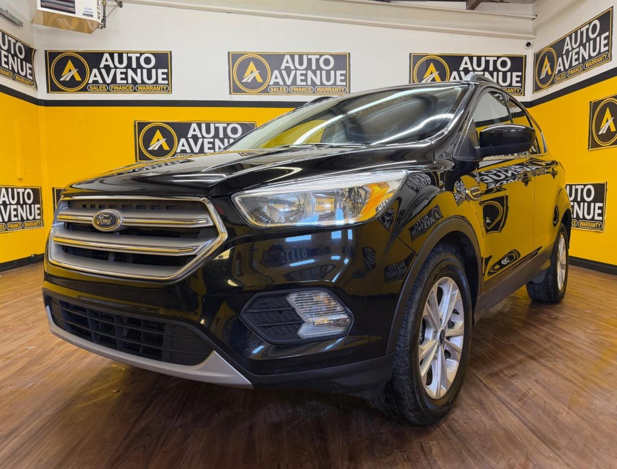 This outstanding example of a 2018 Ford Escape SE is proudly offered by Auto Avenue Airdrie. <br/> This versatile SUV is the perfect companion for the modern, on-the-go family, combining efficiency, comfort, and capability in one stylish package. With impressive fuel economy, practical features, and responsive performance, the Ford Escape SE delivers a smooth and enjoyable driving experience whether youre commuting through the city or heading out on a weekend adventure. <br/> Equipped with 4WD, this Escape provides added confidence and control in all road conditions, giving you the freedom to explore beyond the pavement. Thoughtfully designed with convenience features like a backup camera and heated seats, every drive is safer, more comfortable, and more enjoyable. <br/> The quintessential Ford, this Escape SE reflects a lifestyle of versatility, reliability, and refined practicality. You can finally stop searching - this is the one youve been waiting for.<br /><br />AUTO AVENUE IS AN AMVIC LICENSED DEALERSHIP, COMMITTED TO PROVIDING EXCEPTIONAL SERVICE AND QUALITY VEHICLES WITH FLEXIBLE PAYMENT OPTIONS. <br/>