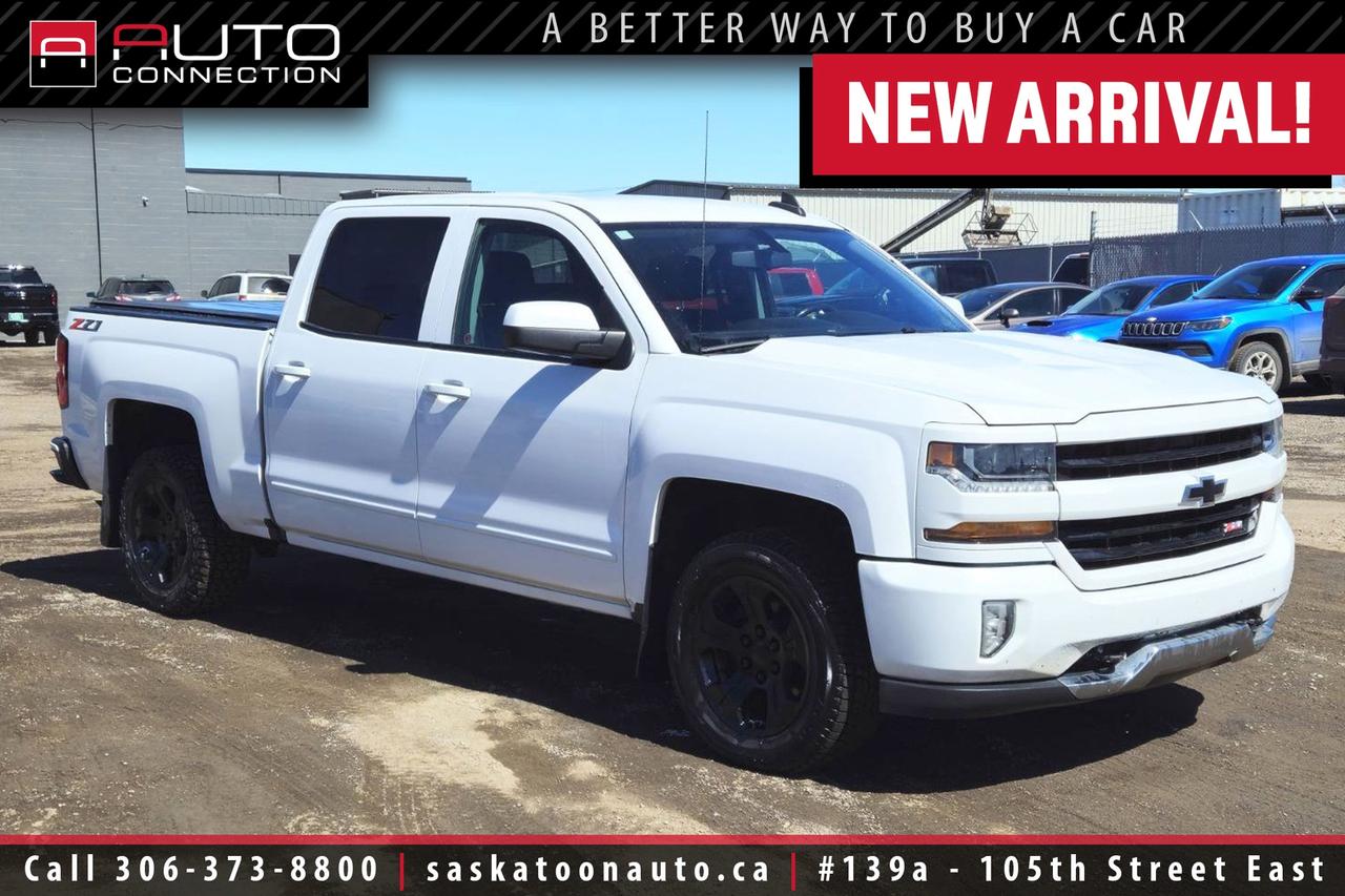 <p><span><font color=#000000><span>Financing & Warranty Available!</span><span><br></span></font></span><span><br></span><b><span>Crew Cab w/ 5.8ft. Box - Accident Free! - Exceptional Condition</span><span><br></span></b><span><br>This accident-free <b>2018 Chevrolet Silverado 1500 LT Z71 Crew Cab</b> in Summit White delivers the perfect balance of rugged capability and everyday comfort. Under the hood, the proven 5.3L EcoTec3 V8 paired with a 6-speed automatic transmission and 4x4 gives you the power and confidence to handle tough jobs or weekend adventures with ease. Equipped with the Z71 Off-Road Package, this truck is built to tackle rough terrain while maintaining a smooth, controlled ride on the highway. Inside, the spacious Crew Cab features a well-appointed Jet Black cloth interior with heated front seats, power-adjustable bucket seats, and dual-zone automatic climate control to keep everyone comfortable. The 8-inch touchscreen and Bose premium sound system create an enjoyable driving experience, while wireless charging and remote start add everyday convenience. Safety and visibility are enhanced with a rear vision camera, heated power mirrors, HID headlights, and LED fog lamps. When its time to tow, the Trailering Package with an integrated brake controller and locking rear differential ensures youre ready for the job. Finished with bold Z71 styling details and a clean, confident stance, this Silverado stands out as a dependable and well-equipped truck at Saskatoon Auto Connection.<br><br></span><span>Key Features:</span><span><br></span><span><br>- 4x4<br>- Z71 Off-Road & Appearance Packages<br>- True North Edition<br>- Heated Seats<br>- Remote Start<br>- Wireless Charging<br>- 7-Speaker Bose Premium Sound System w/ Subwoofer<br>- Rear Vision Camera<br>- 8-Inch Diagonal Colour Touchscreen<br>- Leather-Wrapped Steering Wheel<br>- Power-Adjustable Front Bucket Seats<br>- Dual-Zone Automatic Climate Control<br>- Rear Window Defogger<br>- 110V Auxiliary Power Outlet<br>- Heated Power Sideview Mirrors<br>- High-Intensity Discharge (HID) Headlights<br>- LED Fog Lamps<br>- Unique Z71 Gauge Cluster<br>- Black Chevrolet Front Bowtie Emblem<br>- Body-Colour Front & Rear Bumpers<br>- Body-Colour Grille Surround & Headlamp Bezels<br>- Tonneau Cover<br>- Trailering Package<br>- Integrated Trailer Brake Controller<br>- Hill Descent Control<br>- 3.08 Rear Axle Ratio<br>- Heavy-Duty Automatic Locking Rear Differential<br>- 6-Speed Automatic Transmission<br>- 5.3L EcoTec3 8-Cylinder Engine<br><br><b>Exterior Colour:</b> Summit White<br><b>Interior Colour:</b> Jet Black Cloth<br><br><b>Manufacturers Brochure:</b> </span><a href=https://www.auto-brochures.com/makes/Chevrolet/Silverado/Chevrolet_US%20Silverado_2018.pdf target=_blank><span>https://www.auto-brochures.com/makes/Chevrolet/Silverado/Chevrolet_US%20Silverado_2018.pdf</span></a><span><br><br></span><span>Unlock a full year of exclusive VIP benefits with your purchase! Enjoy 20% off labour, 25% off tires, free windshield stone chip repairs, and so much more. Visit saskatoonauto.ca for all the details.<br></span><span><br>Honesty Pricing eliminates the haggle hassle by providing you with our lowest possible selling price up front. In fact, it is the lowest price in our market, and we will prove it by disclosing a comprehensive market report of what our competitors are selling similar vehicles for.<br></span><span><br>This vehicle meets our Diamond Certification standard, which begins by selecting only premium quality vehicles and subjecting them to a much more comprehensive inspection process than typical dealerships use. Diamond Certified ensures a clean history, exceptional appearance and problem-free operation.<br></span><span><br>At Saskatoon Auto Connection we sell pre-owned automobiles the way we would like to buy them ourselves. Since 2008, we have been dedicated to providing the highest level of integrity and transparency in our industry, in combination with the highest quality vehicles at the most competitive prices in Saskatchewan. Our friendly staff is ready to positively redefine your expectations of the pre-owned automobile space.</span><span></span></p>