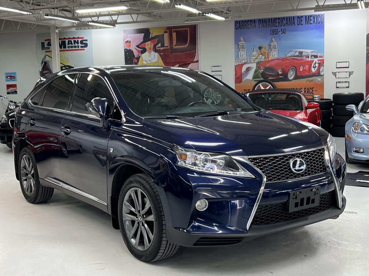 <p>This 2013 RX 350 F-Sport AWD was traded in to us, has been well cared for and comes with a clean, accident-free history. With 163,000 km, it drives exactly as a Lexus should&mdash;smooth, quiet, and refined. These vehicles are widely recognized for their long-term reliability, comfort, and low cost of ownership. Includes Summer and Winter Tires on alloy wheels.&nbsp;</p><p>Finished in a classic and timeless configuration, this RX is an ideal daily driver or family SUV, offering all-wheel drive confidence and Lexus-level build quality.</p><p>Highlights & Features:</p><p>3.5L V6 engine<br>All-Wheel Drive<br>Navigation system<br>Backup camera<br>Power sunroof<br>Leather interior<br>Heated & ventilated front seats<br>Power liftgate<br>Dual-zone climate control<br>Bluetooth connectivity<br>Premium audio system<br>Keyless entry & push-button start<br>Accident free<br>VIN: 2T2BK1BA5DC212107</p><p>We flipped the script.</p><p>At Lee Munro&rsquo;s Garage, we focus on quality &mdash; not volume.</p><p>Every vehicle is fully inspected, serviced, certified, and road-tested before it&rsquo;s offered for sale.</p>
