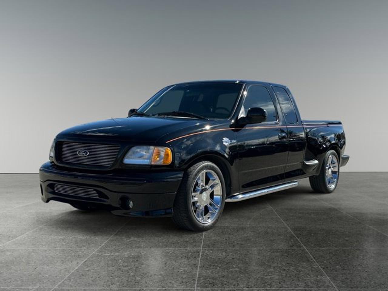 House of Cars Olympic Park An AMVIC licensed automotive retail dealer Location: 8525 Bowfort Rd. N.W Call: 587-356-1144  Stock #: PS-0891-6 Year: 2000 Make: Ford Model: F-150 Harley Davidson XL Flareside VIN: 2FTRX07L9YCB15221 KM: 50,562 Color: Black Transmission: Automatic Drivetrain: RWD Body Style: Truck  Key Features: Leather Seats Heated Front Seats Premium Audio System Power Driver Seat Cruise Control Air Conditioning Power Windows Power Locks Chrome Wheels Running Boards Tow Package AM/FM Radio  Additional Highlights: CARFAX Included Professionally Detailed 1000+ Vehicles In Stock  Visit House of Cars Olympic Park or call 587-356-1144 to schedule your test drive today!