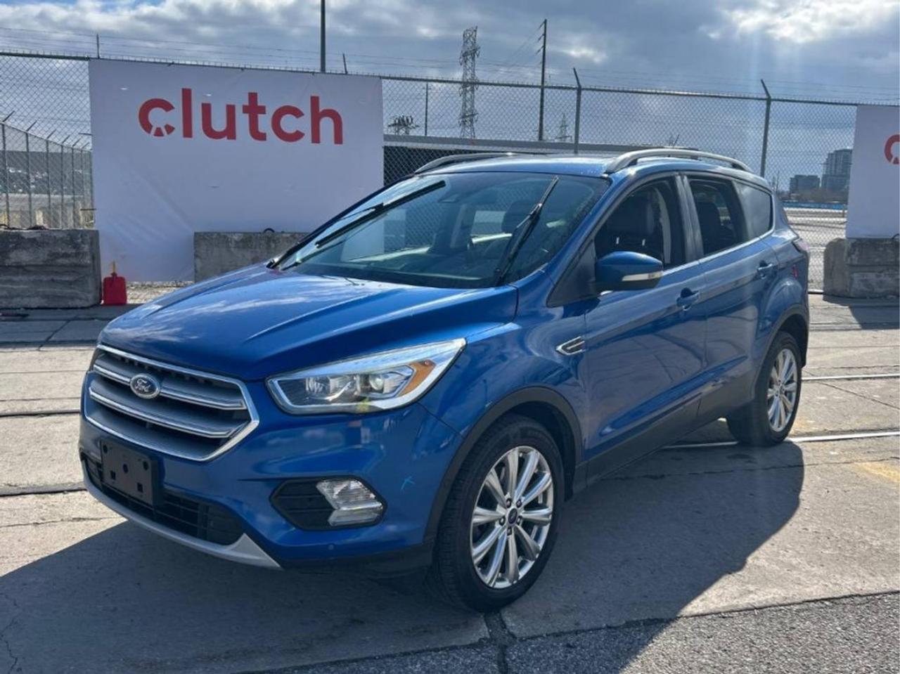 ** ** SPECIAL LIMITED TIME OFFER ** ** PURCHASE ANY VEHICLE THIS WEEK AND RECEIVE 4 BRAND-NEW ALL-SEASON TIRES AT NO ADDITIONAL COST!!! DON   T MISS THIS EXCLUSIVE CHANCE TO UPGRADE YOUR RIDE AND STAY PREPARED FOR ANY WEATHER!!! <br><br>EXCITING NEWS FROM FIRST CHOICE MOTORS! Our brand-new online showroom is now open to the public, bringing the ultimate car shopping experience right to your fingertips! Enjoy a 100% online car shopping experience, with over 500 certified vehicles in stock, comprehensive protection plans, and thousands of new auto parts & accessories available! Plus, for a limited time, were offering FREE deliveries across Ontario on all vehicle purchases! Dont miss out   visit Shop.fcmotors.ca to find and upgrade your perfect vehicle today!<br><br>Welcome to First Choice Motors, the largest car dealership in Toronto of pre-owned cars, SUVs, and vans priced between $5000-$15,000. With an impressive inventory of over 300 vehicles in stock, we are dedicated to providing our customers with a vast selection of affordable and reliable options. <br><br>Were thrilled to offer a used 2017 Ford Escape TITANIUM, blue color with 103,000km (STK#9733) This vehicle was $13990 NOW ON SALE FOR $12990. It is equipped with the following features:<br>- Automatic Transmission<br>- Leather Seats<br>- Sunroof<br>- Heated seats<br>- Navigation<br>- All wheel drive<br>- Bluetooth<br>- Reverse camera<br>- Alloy wheels<br>- Power windows<br>- Power locks<br>- Power mirrors<br>- Air Conditioning<br><br>At First Choice Motors, we believe in providing quality vehicles that our customers can depend on. All our vehicles come with a 36-day guarantee on all safety related items. We also offer additional warranty options up to 5 years for our customers who want extra peace of mind.<br><br>Furthermore, all our vehicles are sold fully certified with brand new brakes rotors and pads, a fresh oil change, and brand new set of all-season tires installed & balanced. You can be confident that this car is in excellent condition and ready to hit the road.<br><br>At First Choice Motors, we believe that everyone deserves a chance to own a reliable and affordable vehicle. Thats why we offer financing options with low interest rates starting at 7.9% O.A.C. Were proud to approve all customers, including those with bad credit, no credit, students, and even 9 socials. Our finance team is dedicated to finding the best financing option for you and making the car buying process as smooth and stress-free as possible.<br><br>Our dealership is open 7 days a week to provide you with the best customer service possible. We carry the largest selection of used vehicles for sale under $9990 in all of Ontario. We stock over 300 cars, mostly Hyundai, Chevrolet, Mazda, Honda, Volkswagen, Toyota, Ford, Dodge, Kia, Mitsubishi, Acura, Lexus, and more. With our ongoing sale, you can find your dream car at a price you can afford. Come visit us today and experience why we are the best choice for your next used car purchase!<br><br>All prices include $22.00 OMVIC Fee.  Excludes, license plates, ownership registration and ONTARIO HST (13%)<br>*No Credit Card payments can be accepted for Vehicle Purchases*