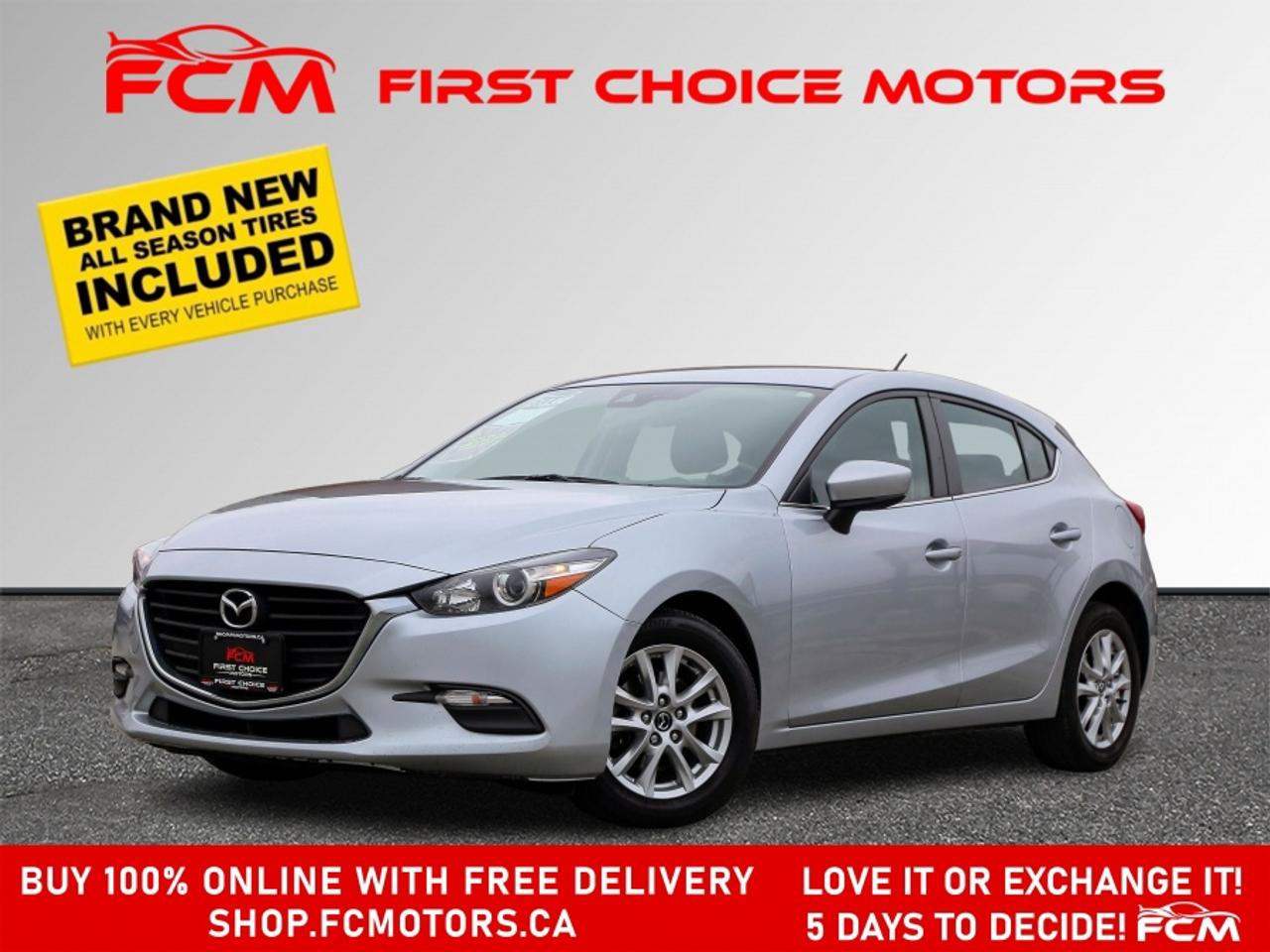 ** ** SPECIAL LIMITED TIME OFFER ** ** PURCHASE ANY VEHICLE THIS WEEK AND RECEIVE 4 BRAND-NEW ALL-SEASON TIRES AT NO ADDITIONAL COST!!! DON   T MISS THIS EXCLUSIVE CHANCE TO UPGRADE YOUR RIDE AND STAY PREPARED FOR ANY WEATHER!!! <br><br>EXCITING NEWS FROM FIRST CHOICE MOTORS! Our brand-new online showroom is now open to the public, bringing the ultimate car shopping experience right to your fingertips! Enjoy a 100% online car shopping experience, with over 500 certified vehicles in stock, comprehensive protection plans, and thousands of new auto parts & accessories available! Plus, for a limited time, were offering FREE deliveries across Ontario on all vehicle purchases! Dont miss out   visit Shop.fcmotors.ca to find and upgrade your perfect vehicle today!<br><br>Welcome to First Choice Motors, the largest car dealership in Toronto of pre-owned cars, SUVs, and vans priced between $5000-$15,000. With an impressive inventory of over 300 vehicles in stock, we are dedicated to providing our customers with a vast selection of affordable and reliable options. <br><br>Were thrilled to offer a used 2018 Mazda MAZDA3 GS Skyactiv, silver color with 172,000km (STK#9734) This vehicle was $13990 NOW ON SALE FOR $12990. It is equipped with the following features:<br>- Automatic Transmission<br>- Hatchback<br>- Heated seats<br>- Bluetooth<br>- Reverse camera<br>- Alloy wheels<br>- Power windows<br>- Power locks<br>- Power mirrors<br>- Air Conditioning<br><br>At First Choice Motors, we believe in providing quality vehicles that our customers can depend on. All our vehicles come with a 36-day guarantee on all safety related items. We also offer additional warranty options up to 5 years for our customers who want extra peace of mind.<br><br>Furthermore, all our vehicles are sold fully certified with brand new brakes rotors and pads, a fresh oil change, and brand new set of all-season tires installed & balanced. You can be confident that this car is in excellent condition and ready to hit the road.<br><br>At First Choice Motors, we believe that everyone deserves a chance to own a reliable and affordable vehicle. Thats why we offer financing options with low interest rates starting at 7.9% O.A.C. Were proud to approve all customers, including those with bad credit, no credit, students, and even 9 socials. Our finance team is dedicated to finding the best financing option for you and making the car buying process as smooth and stress-free as possible.<br><br>Our dealership is open 7 days a week to provide you with the best customer service possible. We carry the largest selection of used vehicles for sale under $9990 in all of Ontario. We stock over 300 cars, mostly Hyundai, Chevrolet, Mazda, Honda, Volkswagen, Toyota, Ford, Dodge, Kia, Mitsubishi, Acura, Lexus, and more. With our ongoing sale, you can find your dream car at a price you can afford. Come visit us today and experience why we are the best choice for your next used car purchase!<br><br>All prices include $22.00 OMVIC Fee.  Excludes, license plates, ownership registration and ONTARIO HST (13%)<br>*No Credit Card payments can be accepted for Vehicle Purchases*
