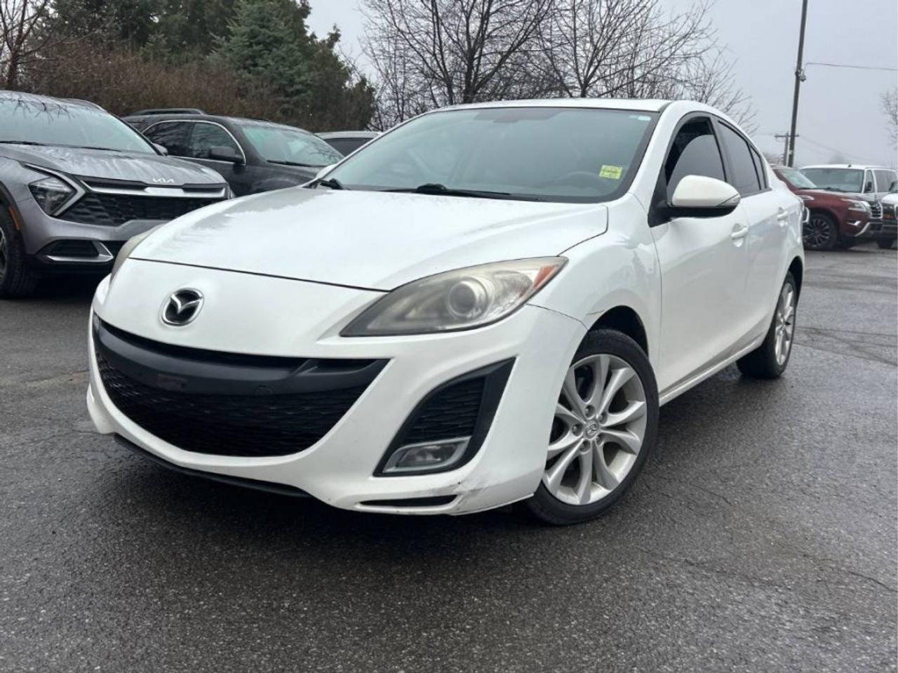 ** ** SPECIAL LIMITED TIME OFFER ** ** PURCHASE ANY VEHICLE THIS WEEK AND RECEIVE 4 BRAND-NEW ALL-SEASON TIRES AT NO ADDITIONAL COST!!! DON   T MISS THIS EXCLUSIVE CHANCE TO UPGRADE YOUR RIDE AND STAY PREPARED FOR ANY WEATHER!!! <br><br>EXCITING NEWS FROM FIRST CHOICE MOTORS! Our brand-new online showroom is now open to the public, bringing the ultimate car shopping experience right to your fingertips! Enjoy a 100% online car shopping experience, with over 500 certified vehicles in stock, comprehensive protection plans, and thousands of new auto parts & accessories available! Plus, for a limited time, were offering FREE deliveries across Ontario on all vehicle purchases! Dont miss out   visit Shop.fcmotors.ca to find and upgrade your perfect vehicle today!<br><br>Welcome to First Choice Motors, the largest car dealership in Toronto of pre-owned cars, SUVs, and vans priced between $5000-$15,000. With an impressive inventory of over 300 vehicles in stock, we are dedicated to providing our customers with a vast selection of affordable and reliable options. <br><br>Were thrilled to offer a used 2010 Mazda MAZDA3 GT, white color with 235,000km (STK#9754) This vehicle was $5490 NOW ON SALE FOR $4990. It is equipped with the following features:<br>- Manual Transmission<br>- Sunroof<br>- Heated seats<br>- Bluetooth<br>- Alloy wheels<br>- Power windows<br>- Power locks<br>- Power mirrors<br>- Air Conditioning<br><br>At First Choice Motors, we believe in providing quality vehicles that our customers can depend on. All our vehicles come with a 36-day guarantee on all safety related items. We also offer additional warranty options up to 5 years for our customers who want extra peace of mind.<br><br>Furthermore, all our vehicles are sold fully certified with brand new brakes rotors and pads, a fresh oil change, and brand new set of all-season tires installed & balanced. You can be confident that this car is in excellent condition and ready to hit the road.<br><br>At First Choice Motors, we believe that everyone deserves a chance to own a reliable and affordable vehicle. Thats why we offer financing options with low interest rates starting at 7.9% O.A.C. Were proud to approve all customers, including those with bad credit, no credit, students, and even 9 socials. Our finance team is dedicated to finding the best financing option for you and making the car buying process as smooth and stress-free as possible.<br><br>Our dealership is open 7 days a week to provide you with the best customer service possible. We carry the largest selection of used vehicles for sale under $9990 in all of Ontario. We stock over 300 cars, mostly Hyundai, Chevrolet, Mazda, Honda, Volkswagen, Toyota, Ford, Dodge, Kia, Mitsubishi, Acura, Lexus, and more. With our ongoing sale, you can find your dream car at a price you can afford. Come visit us today and experience why we are the best choice for your next used car purchase!<br><br>All prices include $22.00 OMVIC Fee.  Excludes, license plates, ownership registration and ONTARIO HST (13%)<br>*No Credit Card payments can be accepted for Vehicle Purchases*